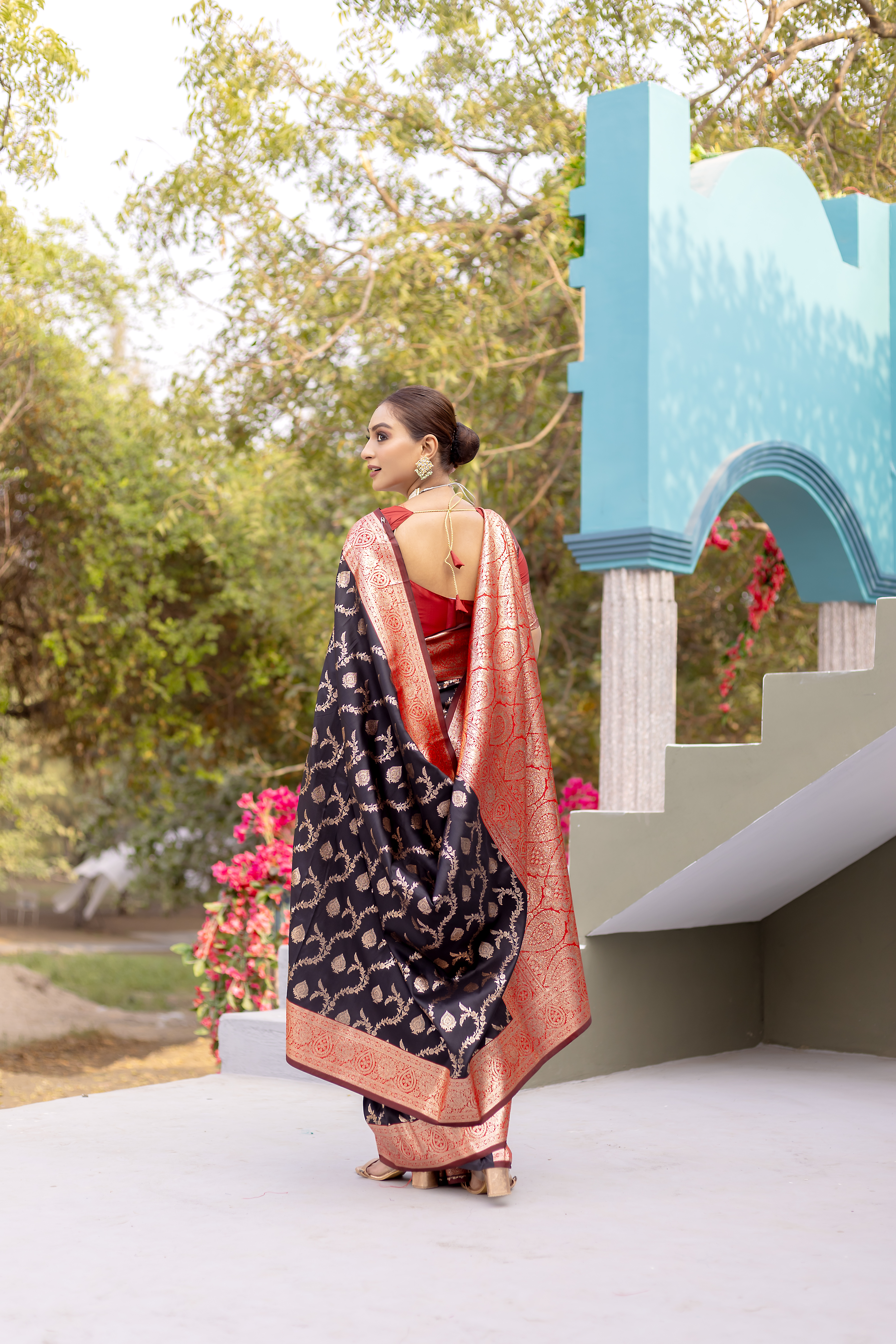 Elegant Charm in Black and Orange Banarasi Silk Saree
