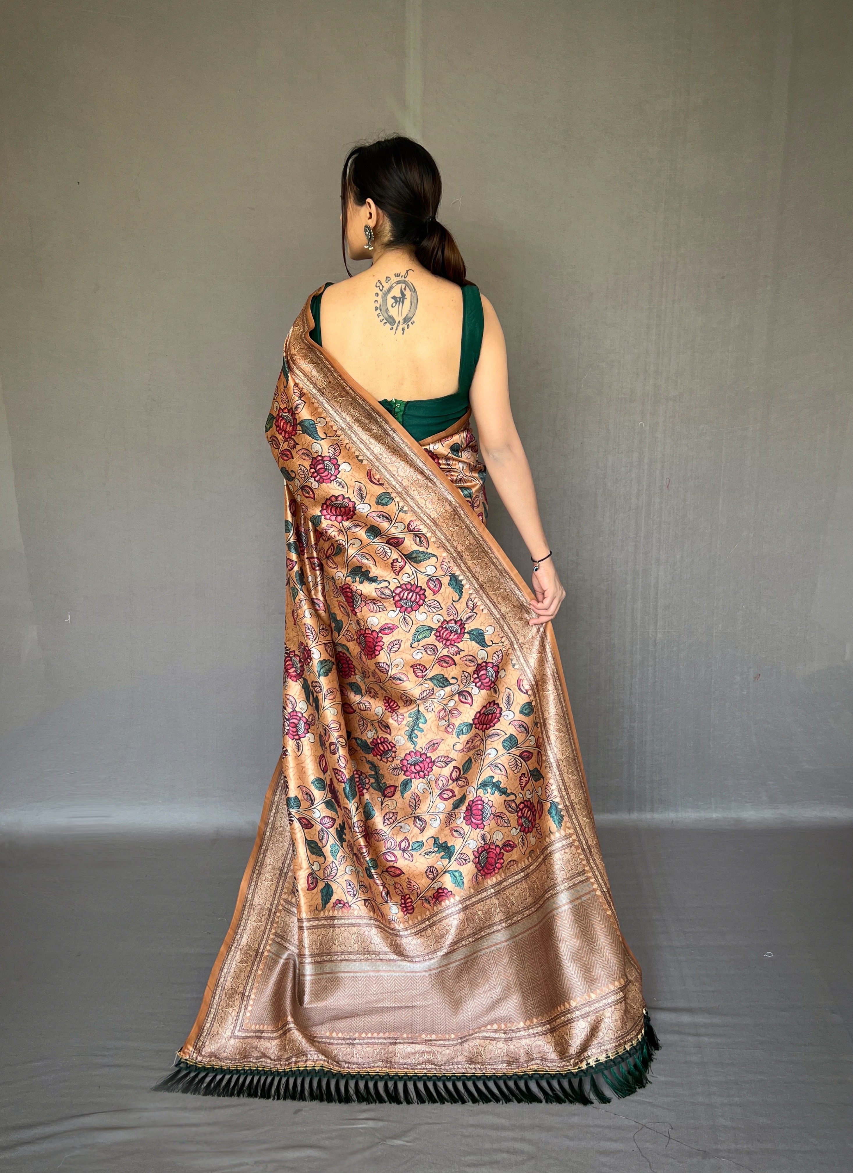 Embrace the richness of tradition with our Golden Soft Silk Kalamkari Saree