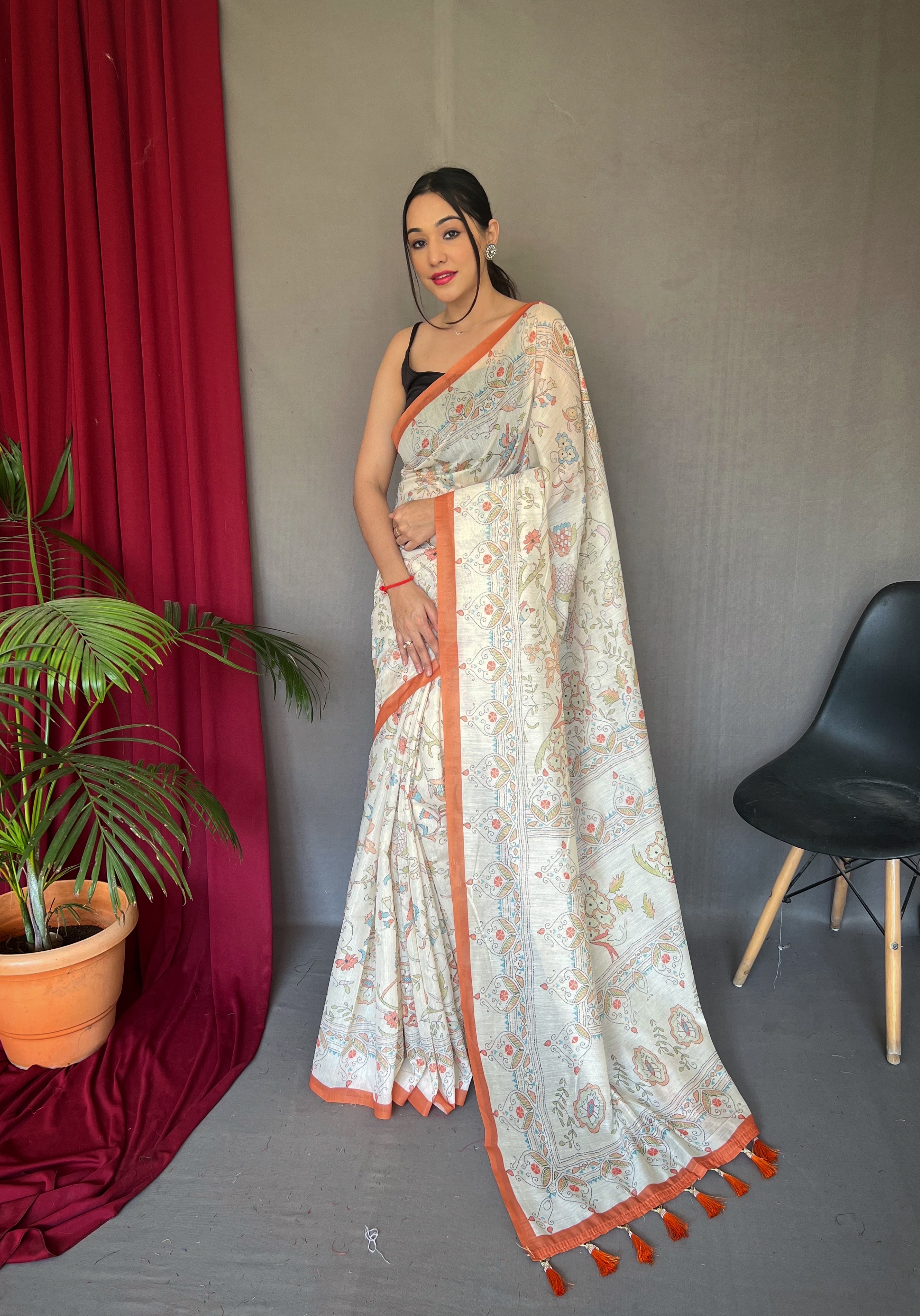 Graceful Elegance in White Malai Cotton Printed Saree with Orange Border