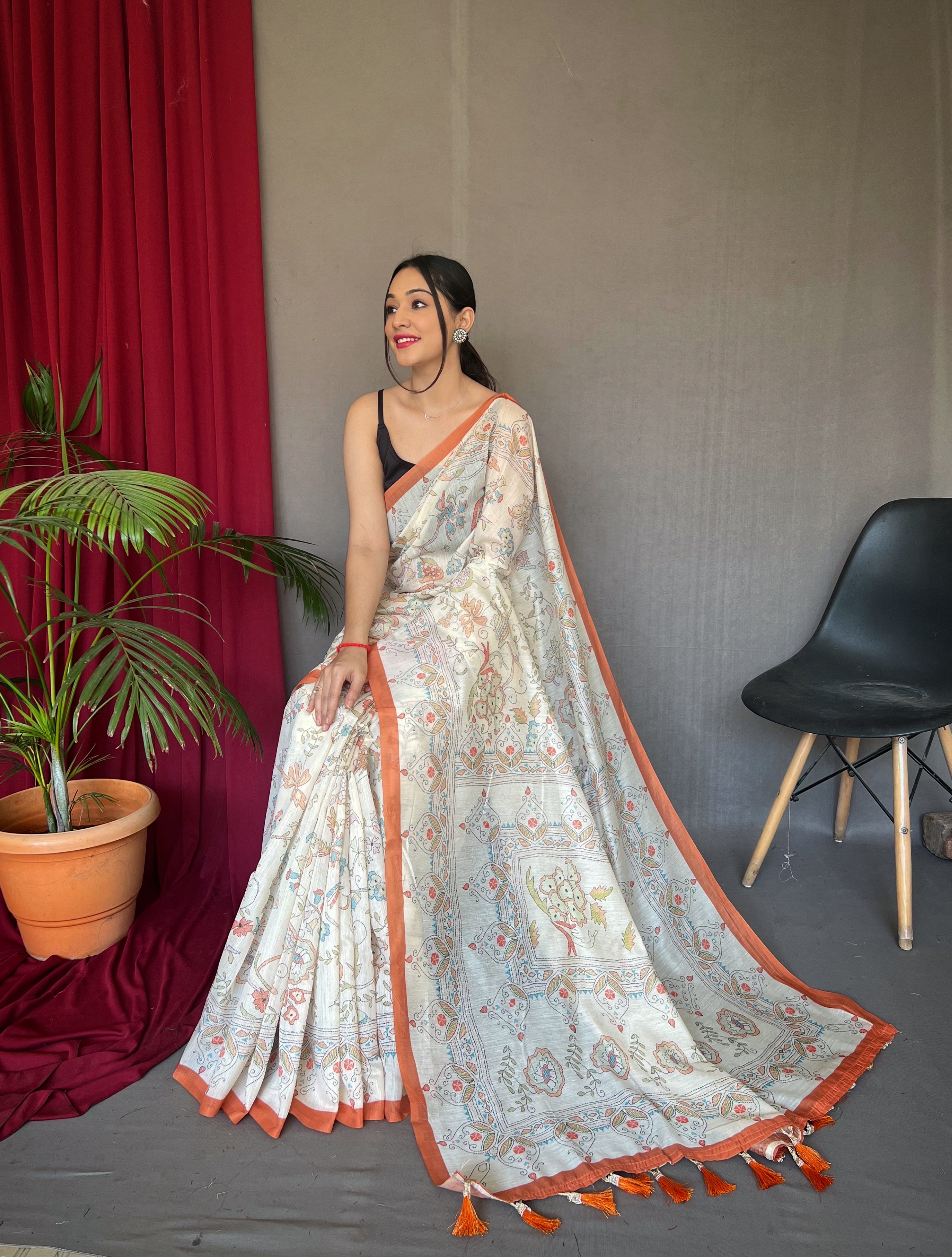 Graceful Elegance in White Malai Cotton Printed Saree with Orange Border