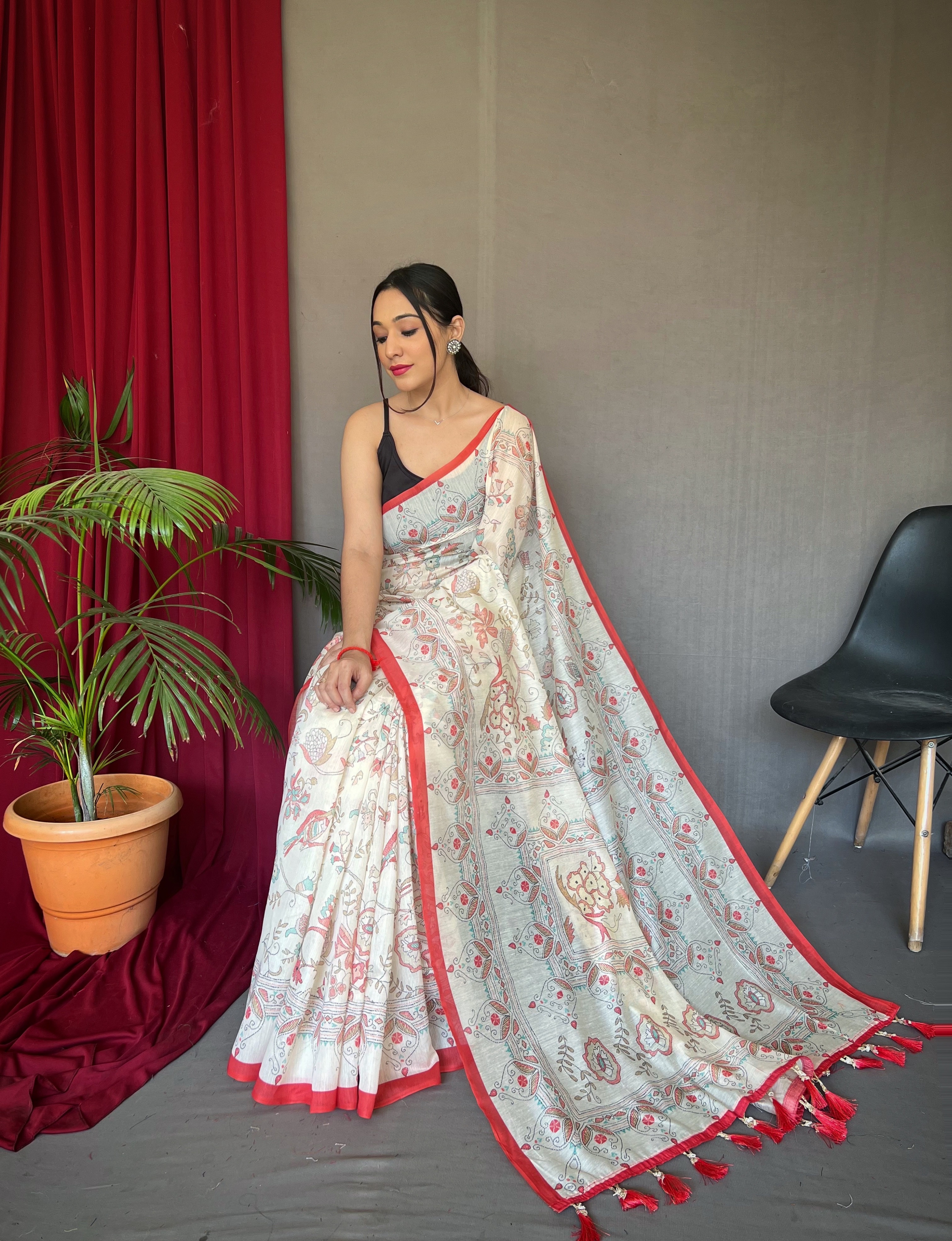 Elevate your ethnic style with our White Malai Cotton Printed Saree with Red Border
