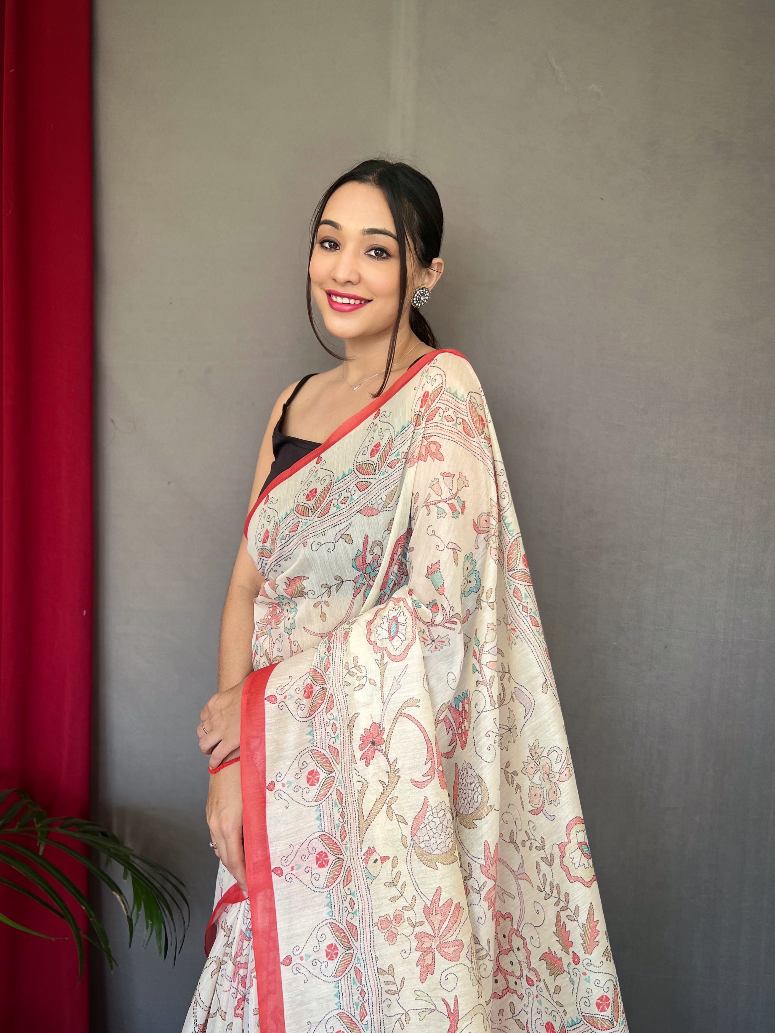 Elevate your ethnic style with our White Malai Cotton Printed Saree with Red Border