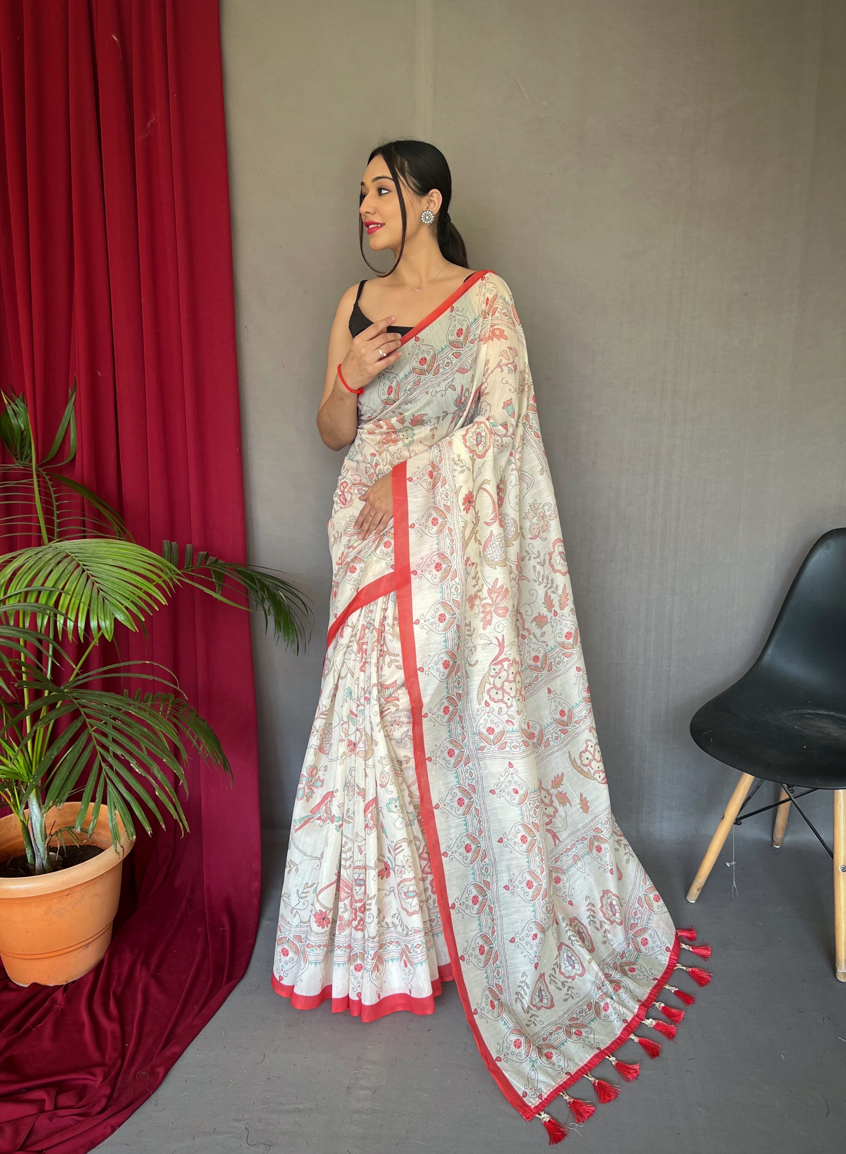 Elevate your ethnic style with our White Malai Cotton Printed Saree with Red Border