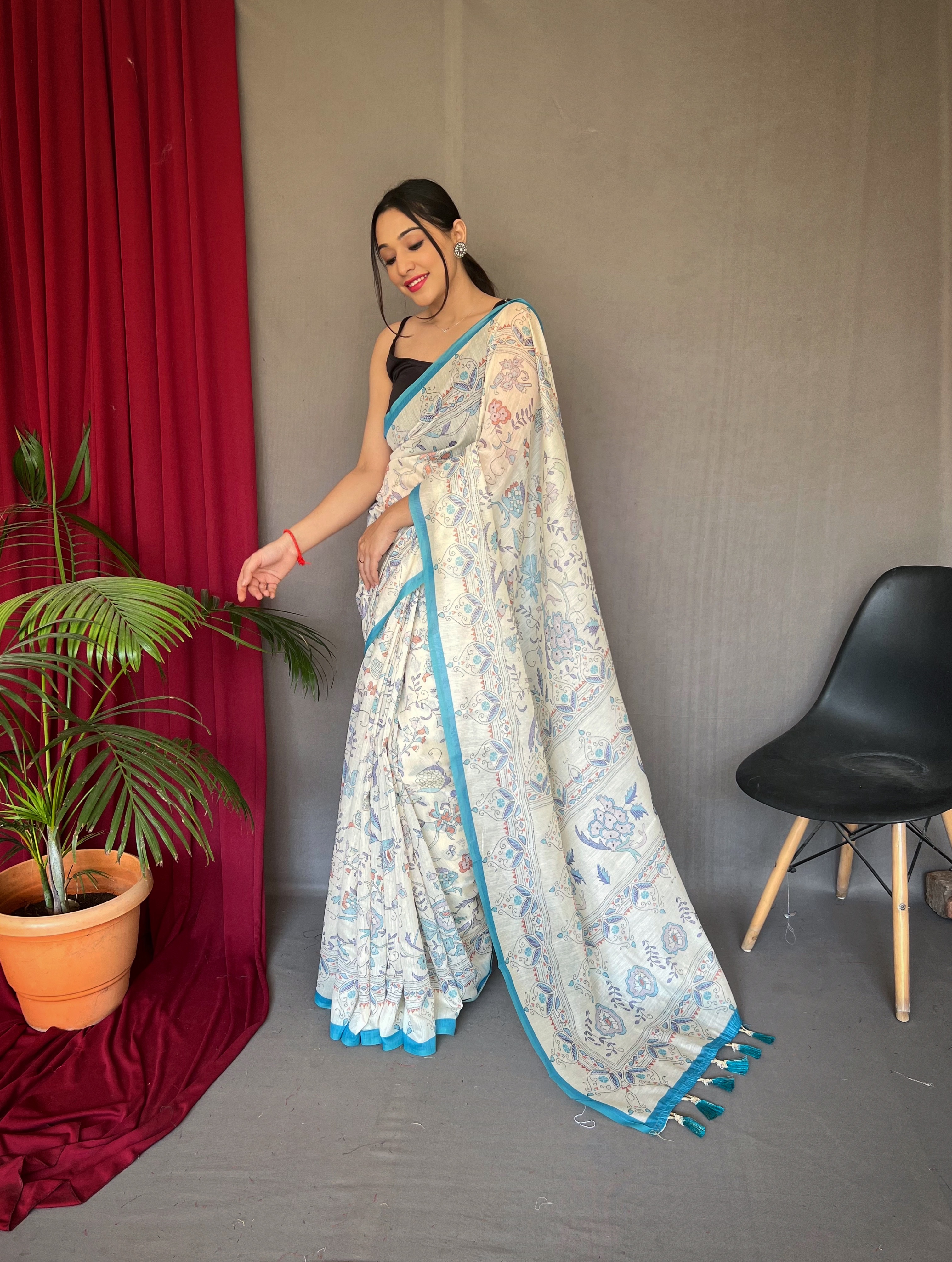 Ethereal Beauty in White Malai Cotton Printed Saree with Sky Blue Border