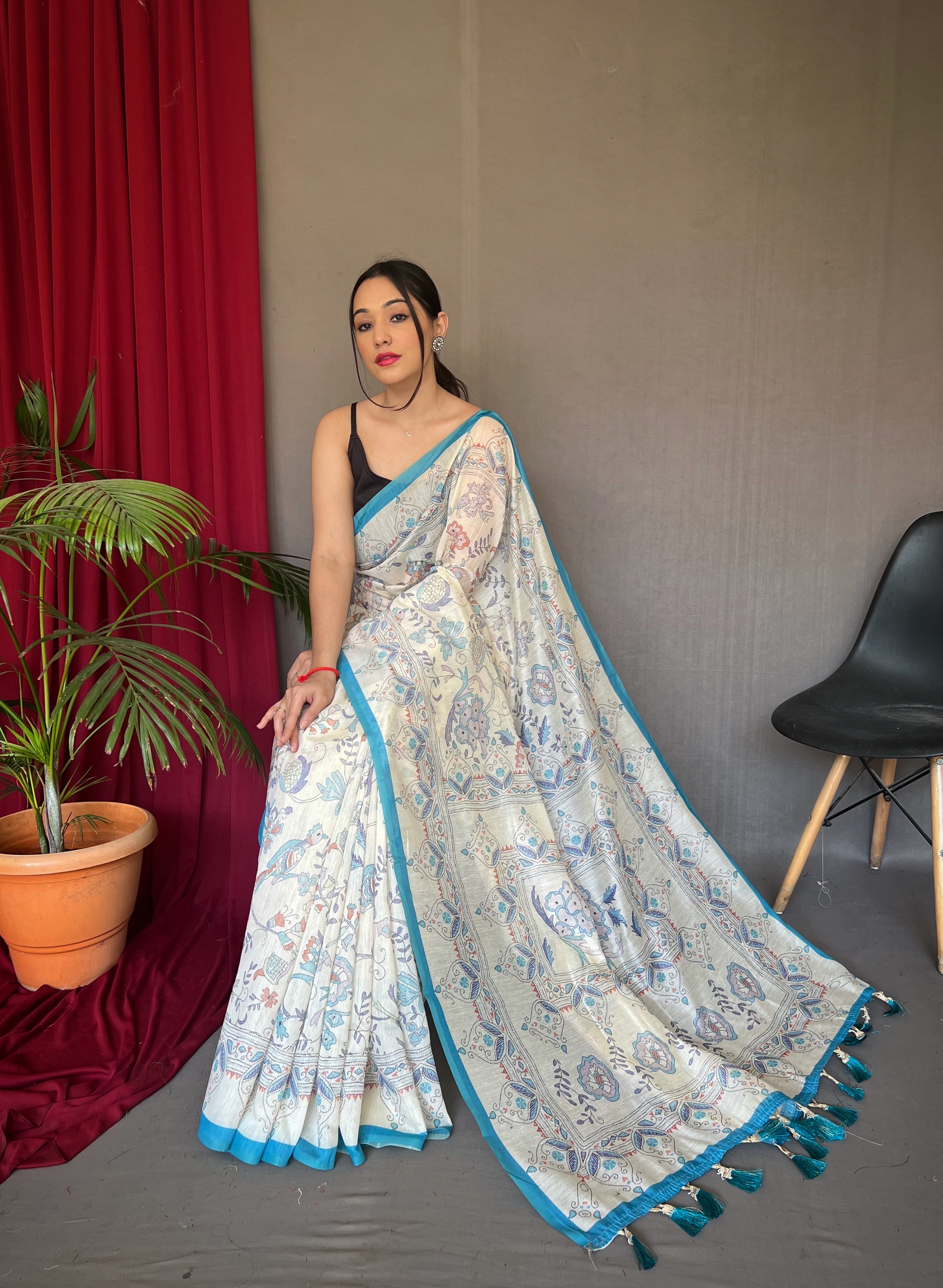 Ethereal Beauty in White Malai Cotton Printed Saree with Sky Blue Border