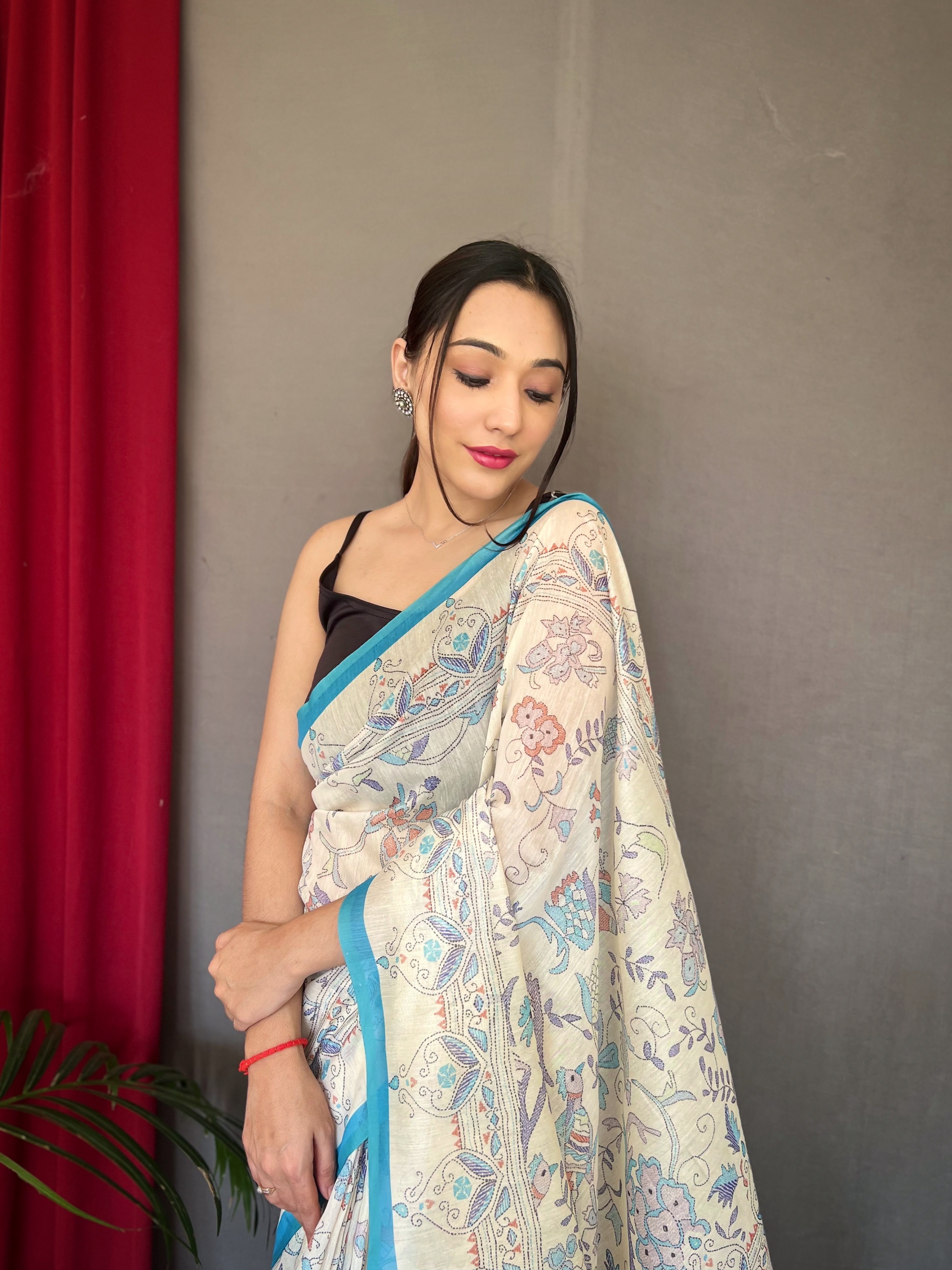 Ethereal Beauty in White Malai Cotton Printed Saree with Sky Blue Border