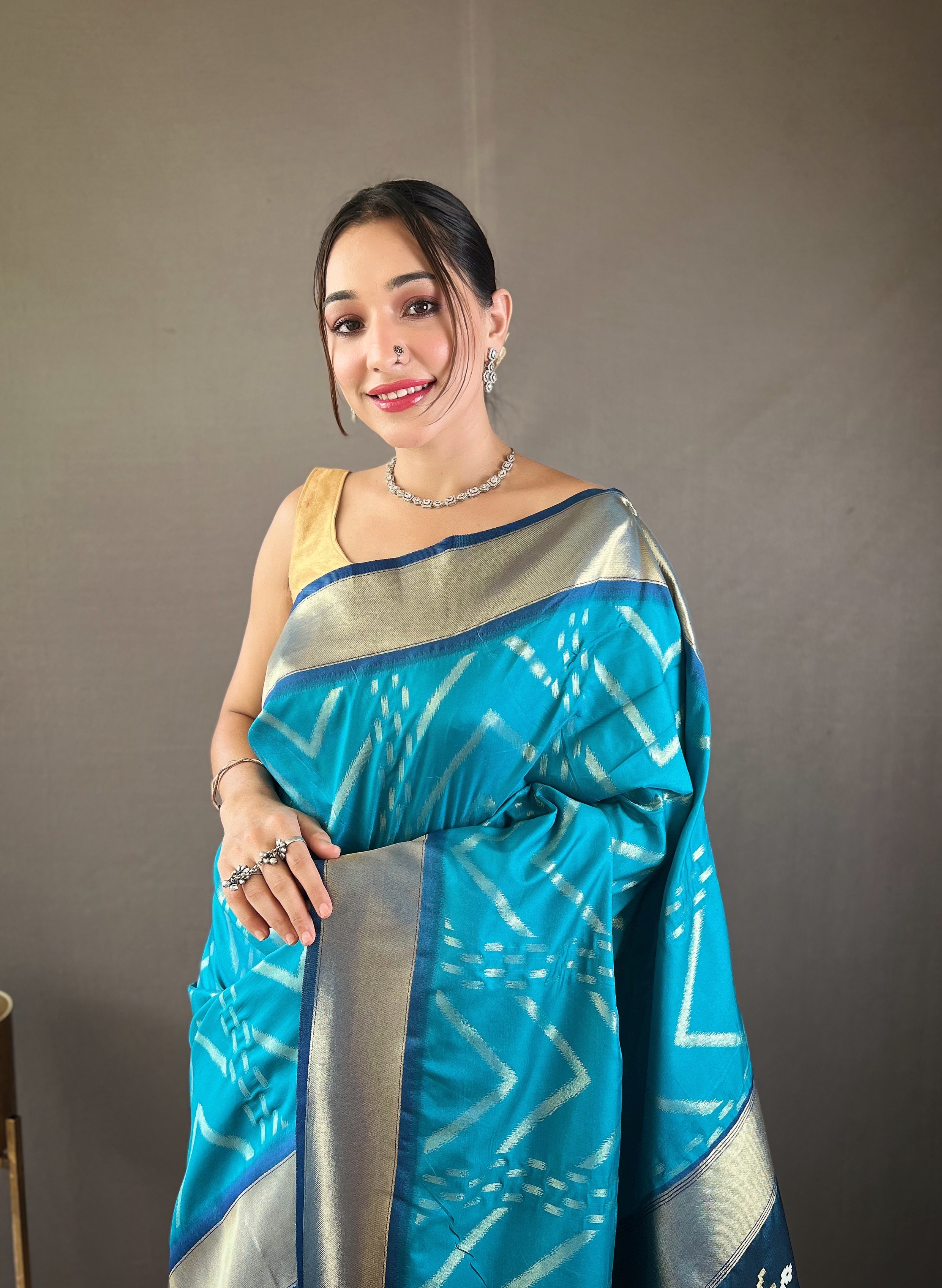 Immerse yourself in the beauty of tradition with our Rama Blue Soft Silk Saree