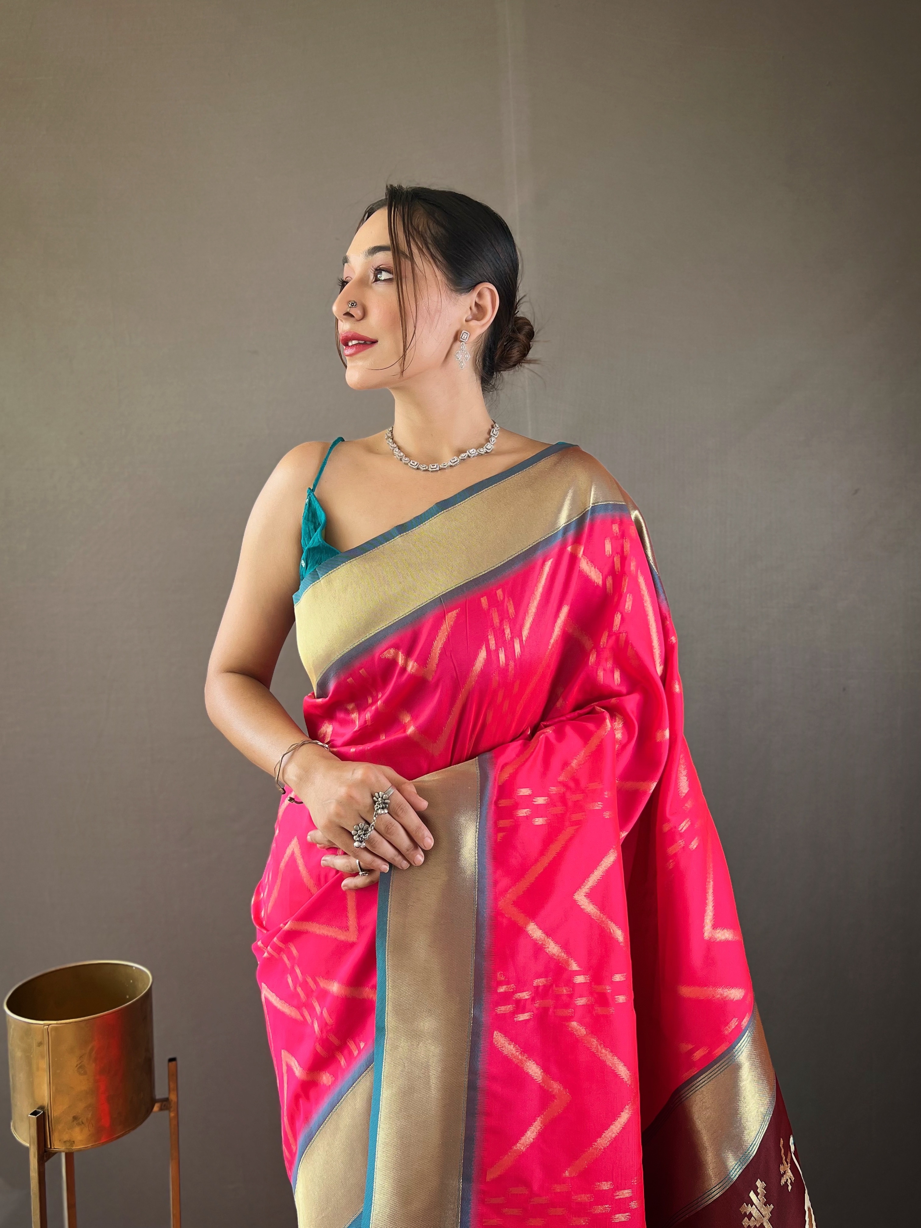 Step into refined sophistication with our Pink Soft Silk Saree