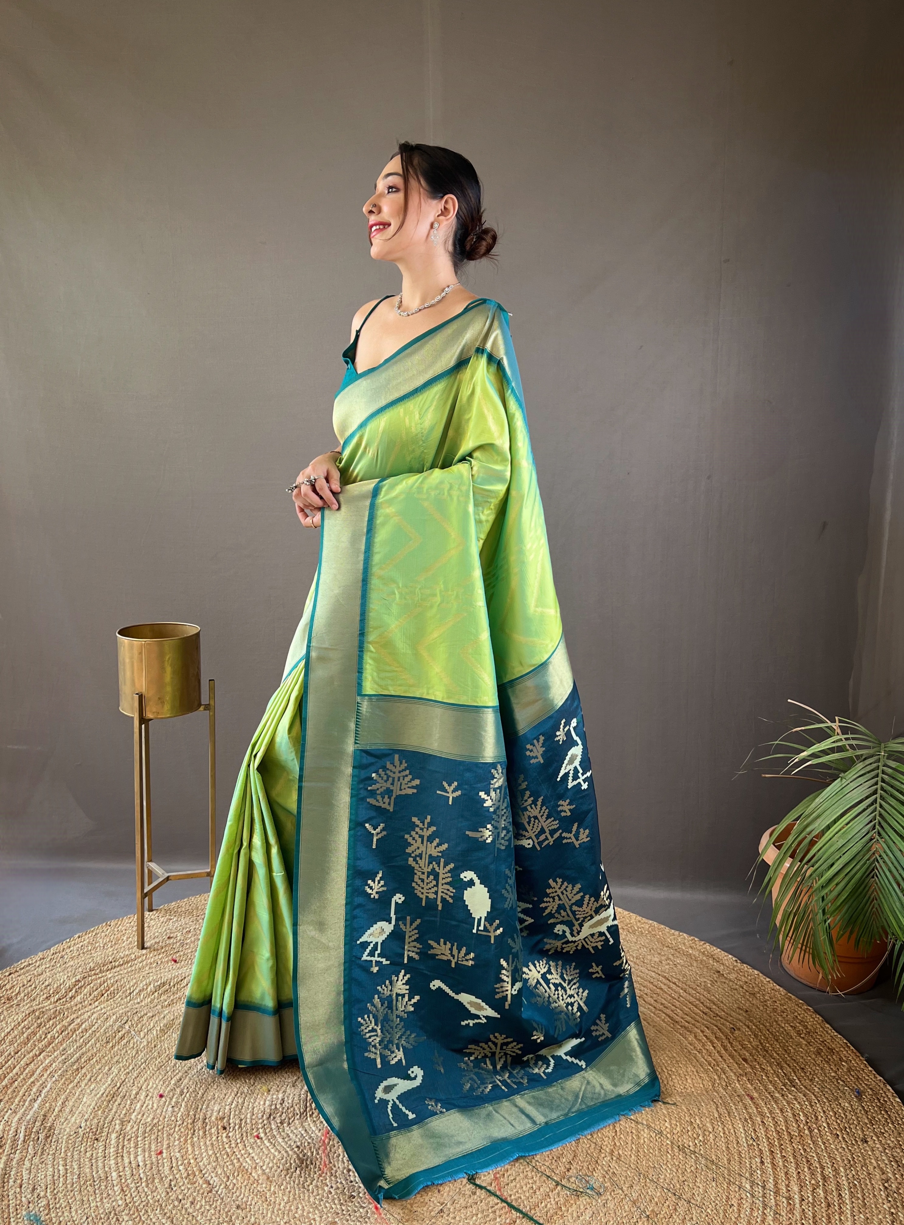 Make a striking statement with our Parrot Green Soft Silk Saree