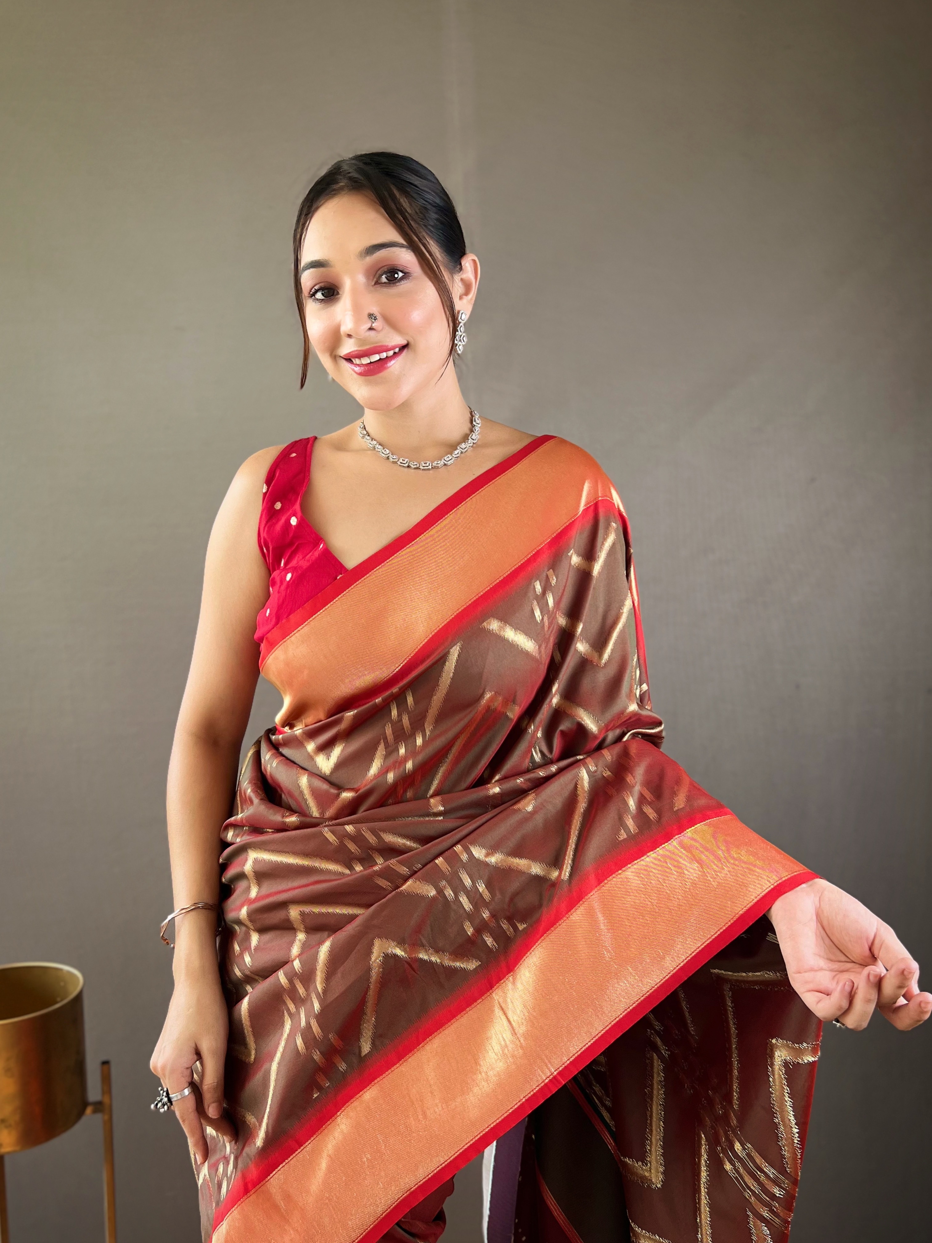 Step into sophistication with this Coffee Brown Soft Silk Saree with Deep Wine Pallu