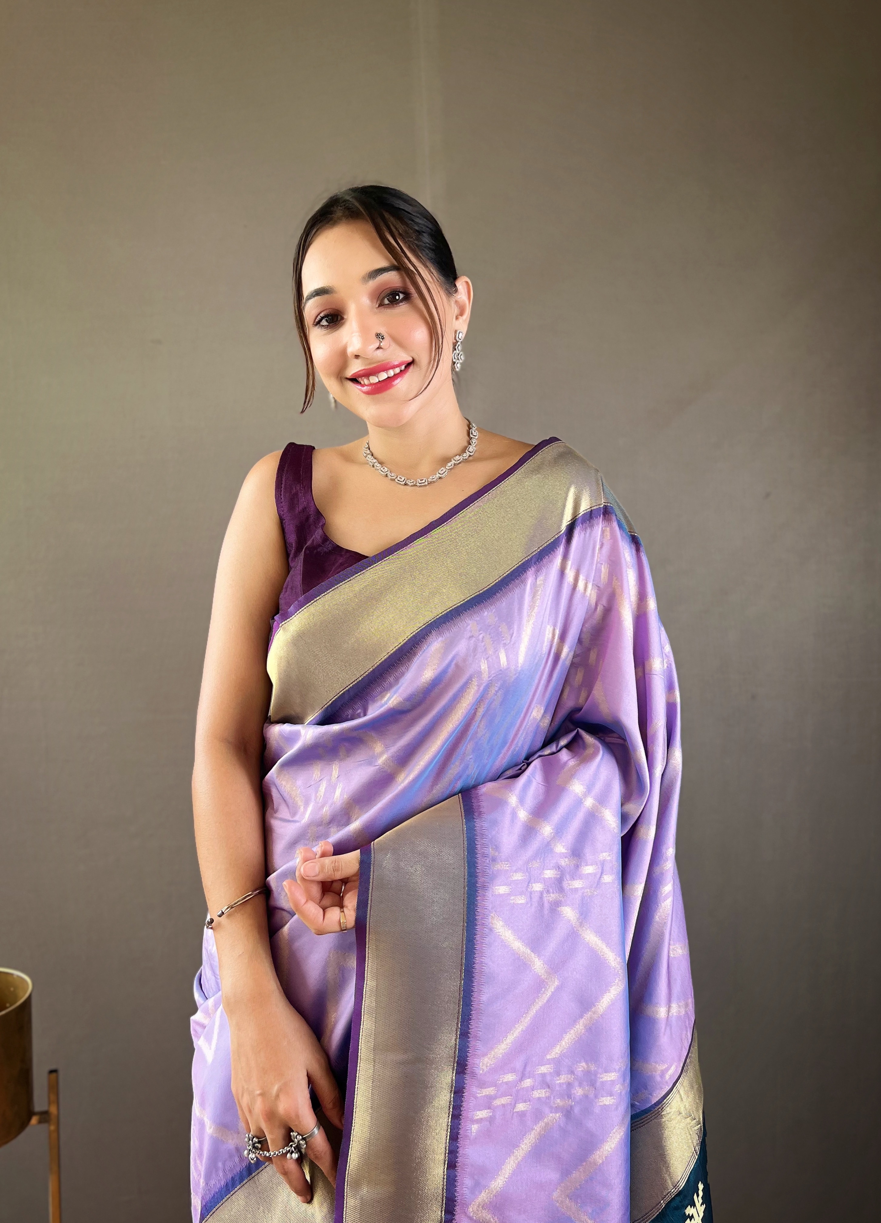Drape yourself in sophistication with this Mauve Soft Silk Saree