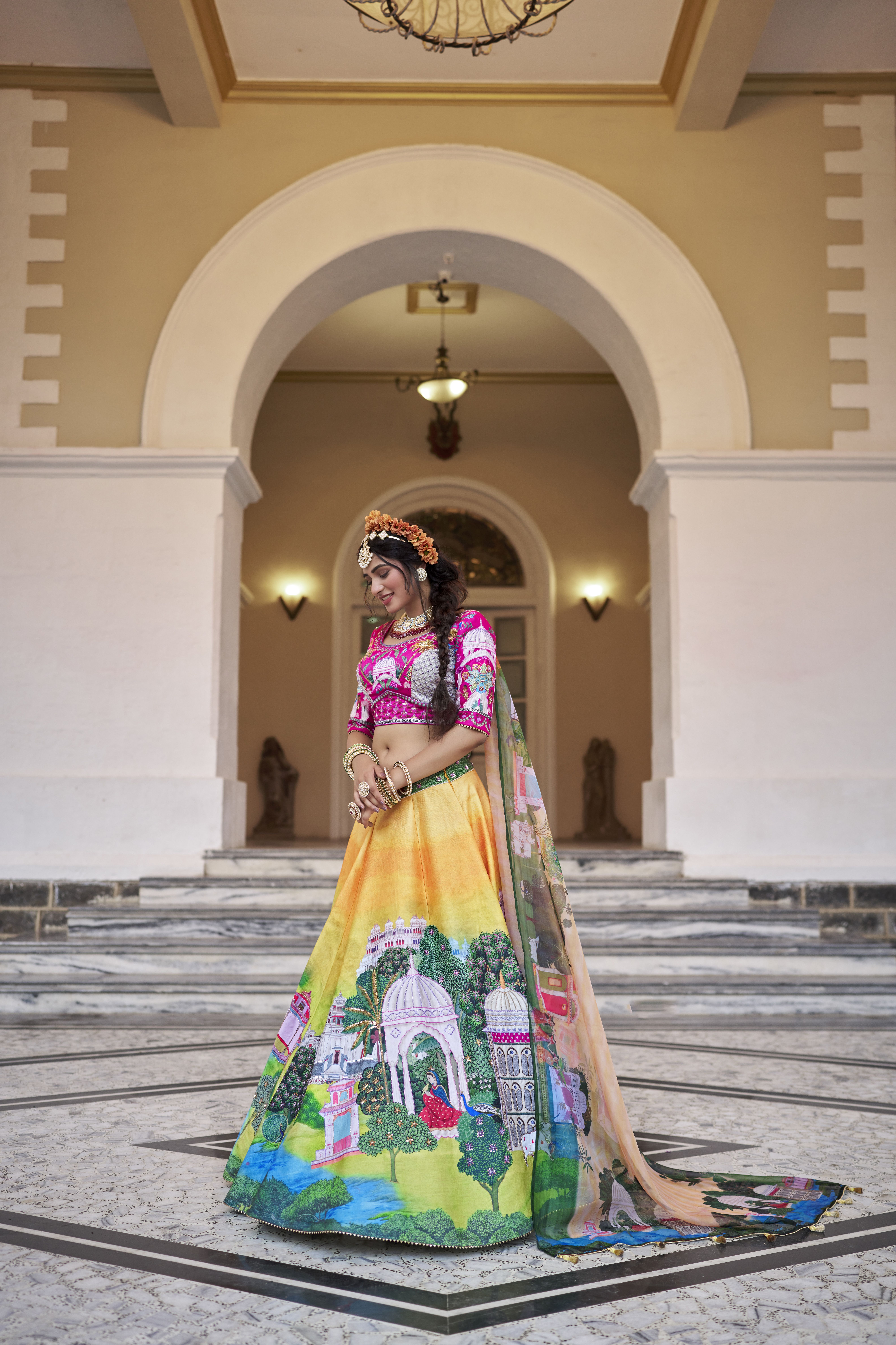 Yellow Designer Lehenga with Pink Blouse Gujarat Inspired Prints & Heavy Handwork