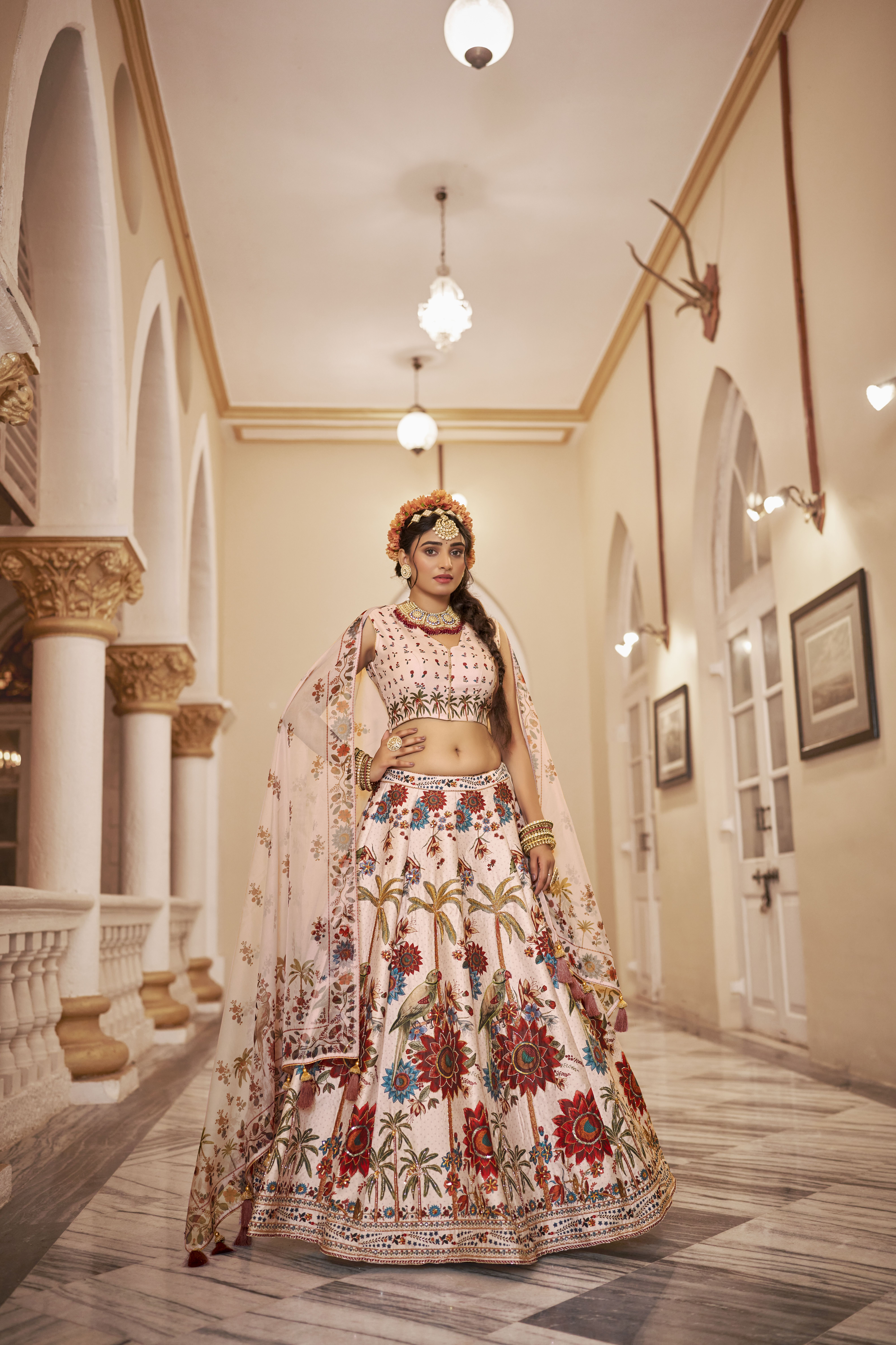 Elevate your ethnic wardrobe with this stunning off-white lehenga set