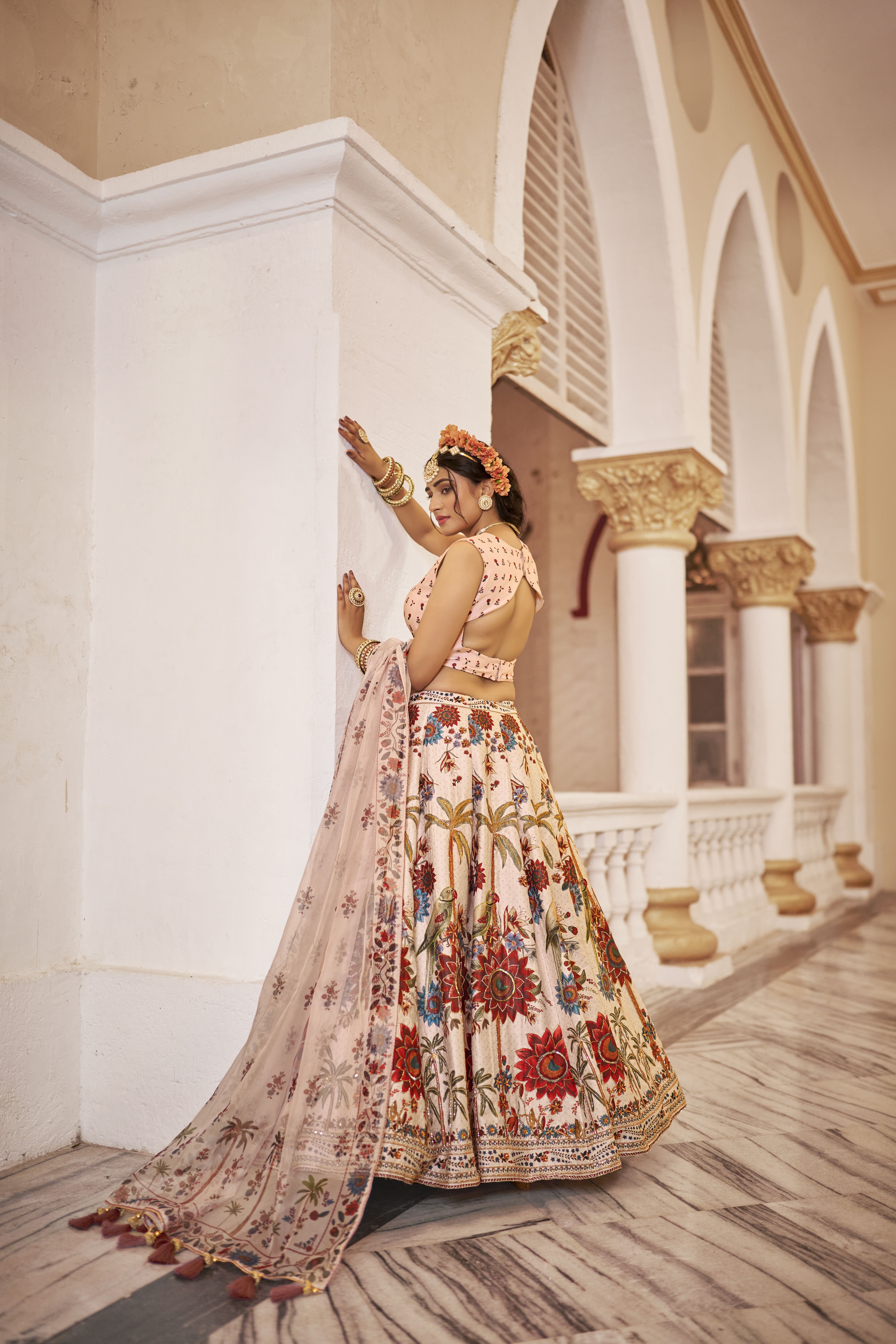 Elevate your ethnic wardrobe with this stunning off-white lehenga set