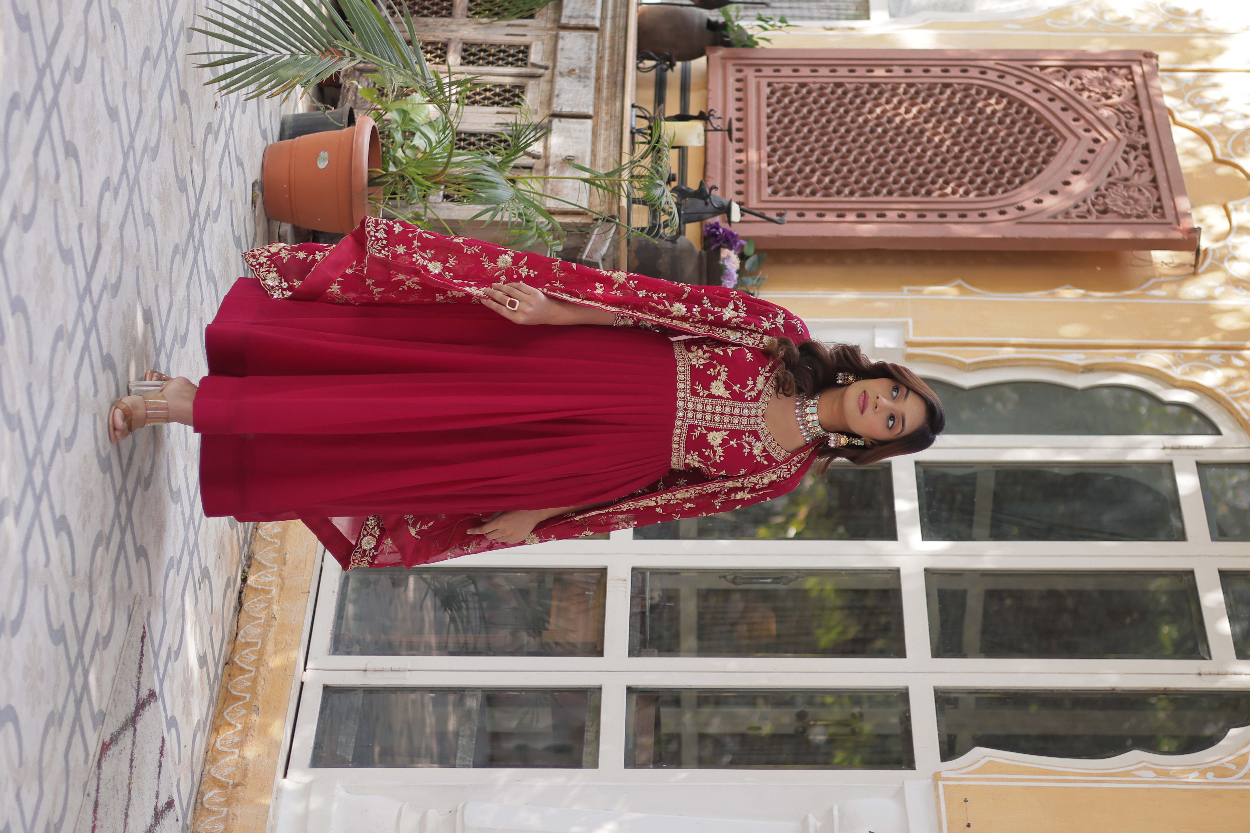Step into effortless grace with this Pink Faux Georgette Salwar Kameez