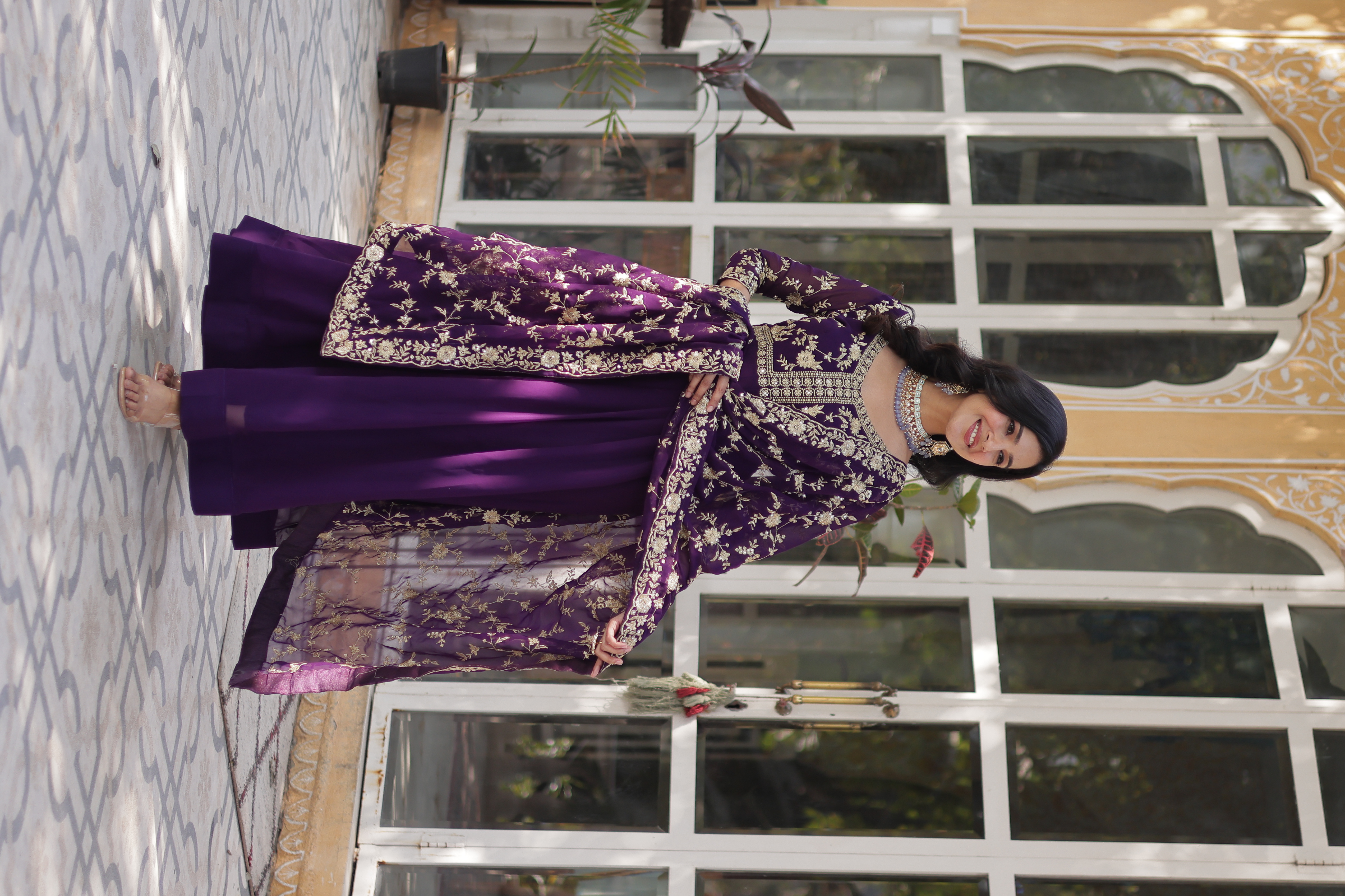 Radiate Festive Elegance in this Purple Gown-Style Suit