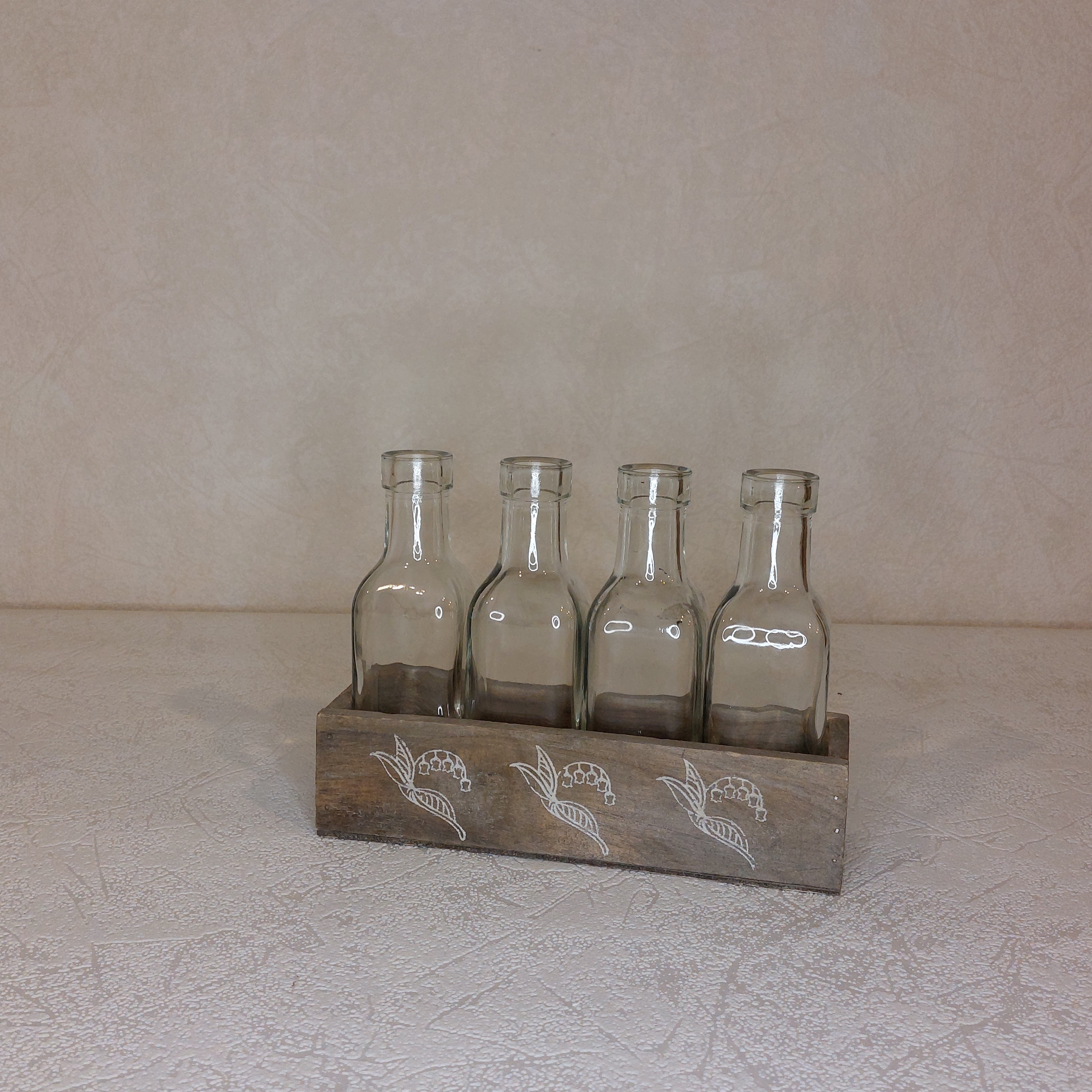 Stikliniai buteliukai su laikikliu