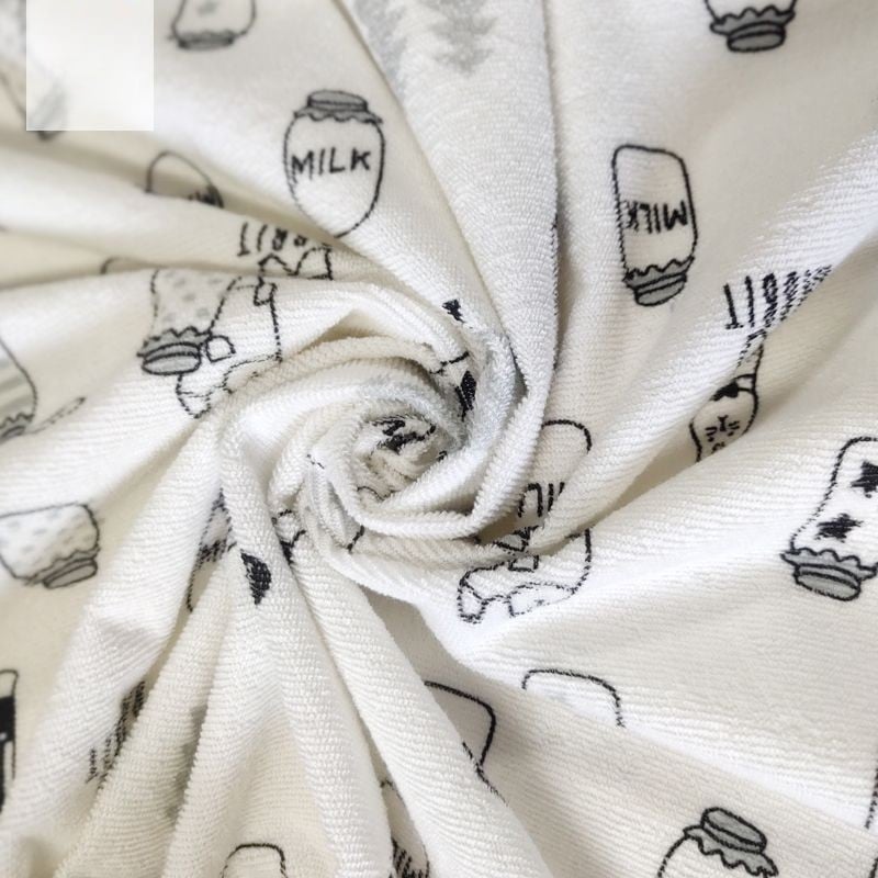 Printed loop terry fabric laminated TPU film