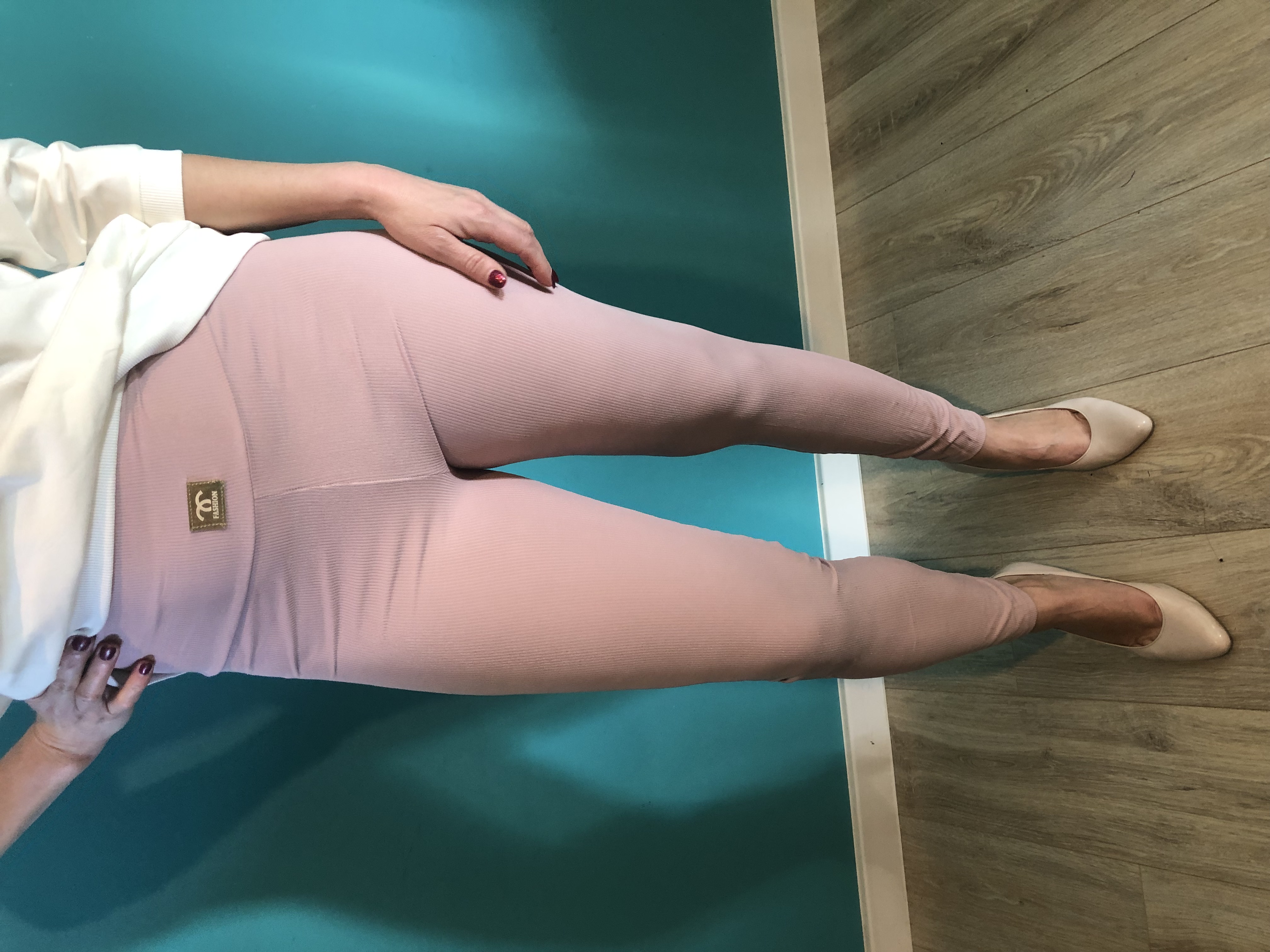 Różowe legginsy damskie