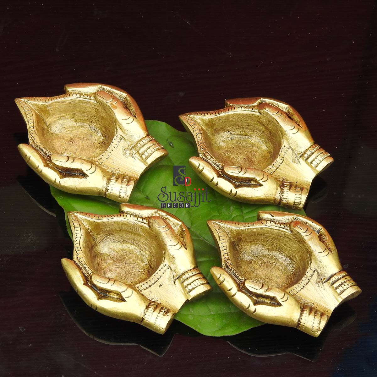 Brass Hand-Shaped Diya Set