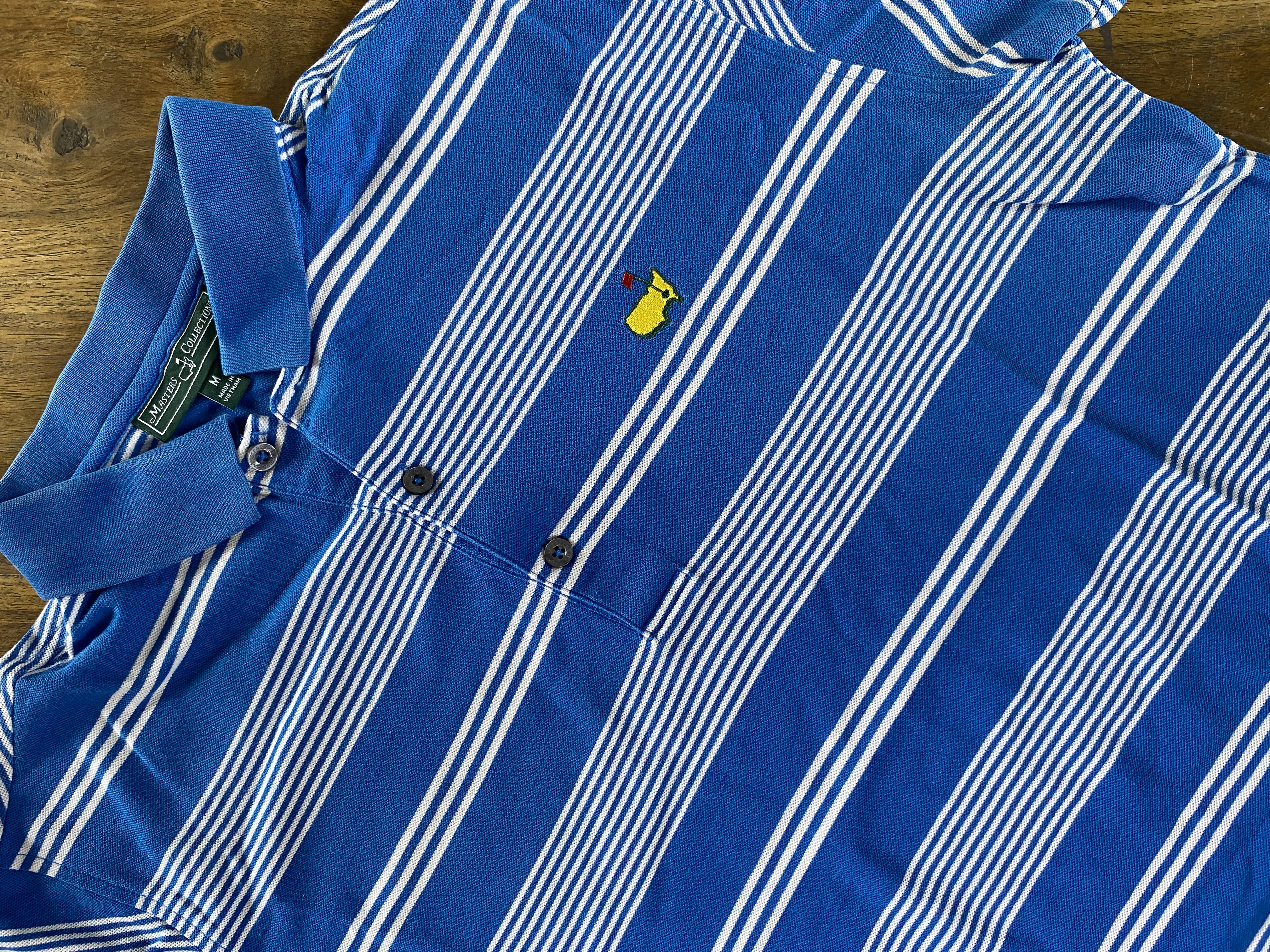 The Masters blue & white striped polo (L)