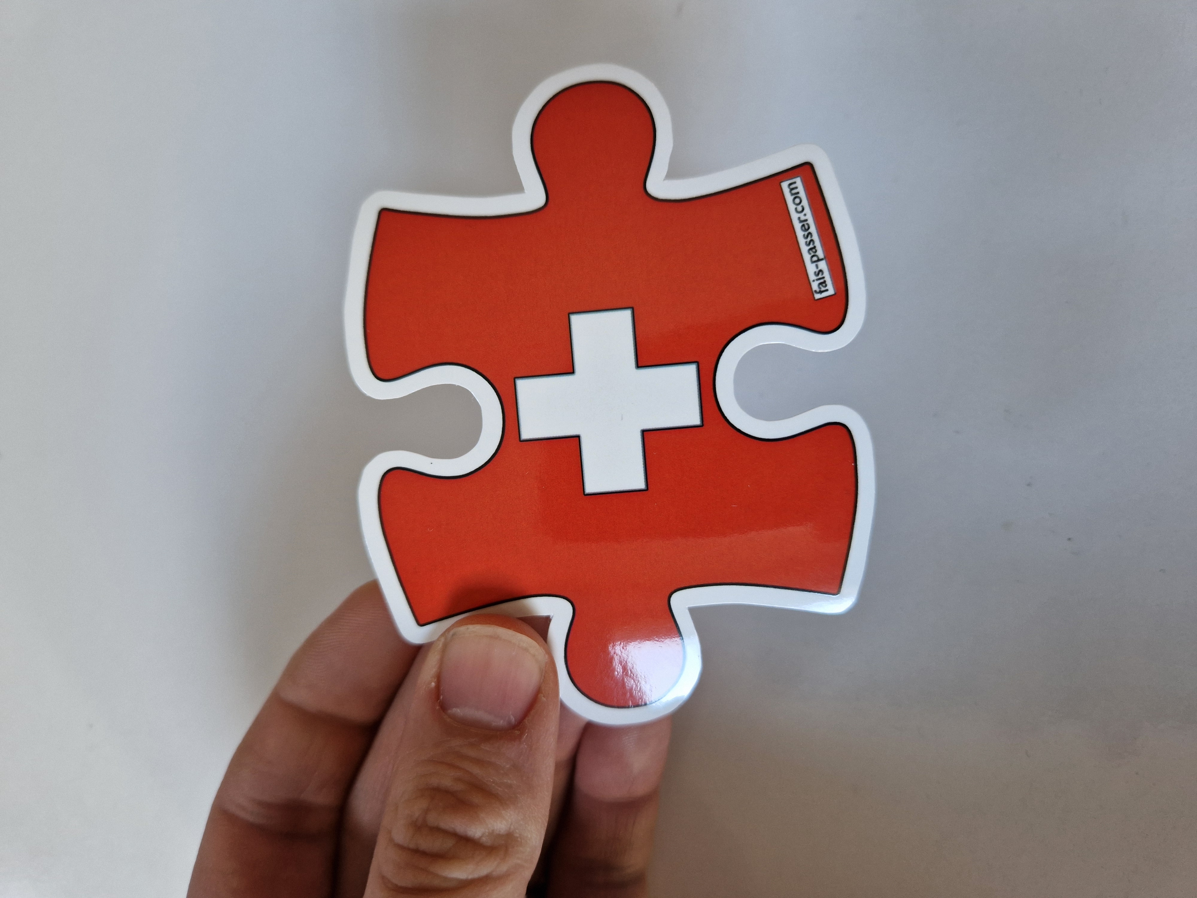 Autocollant Suisse pièce de puzzle