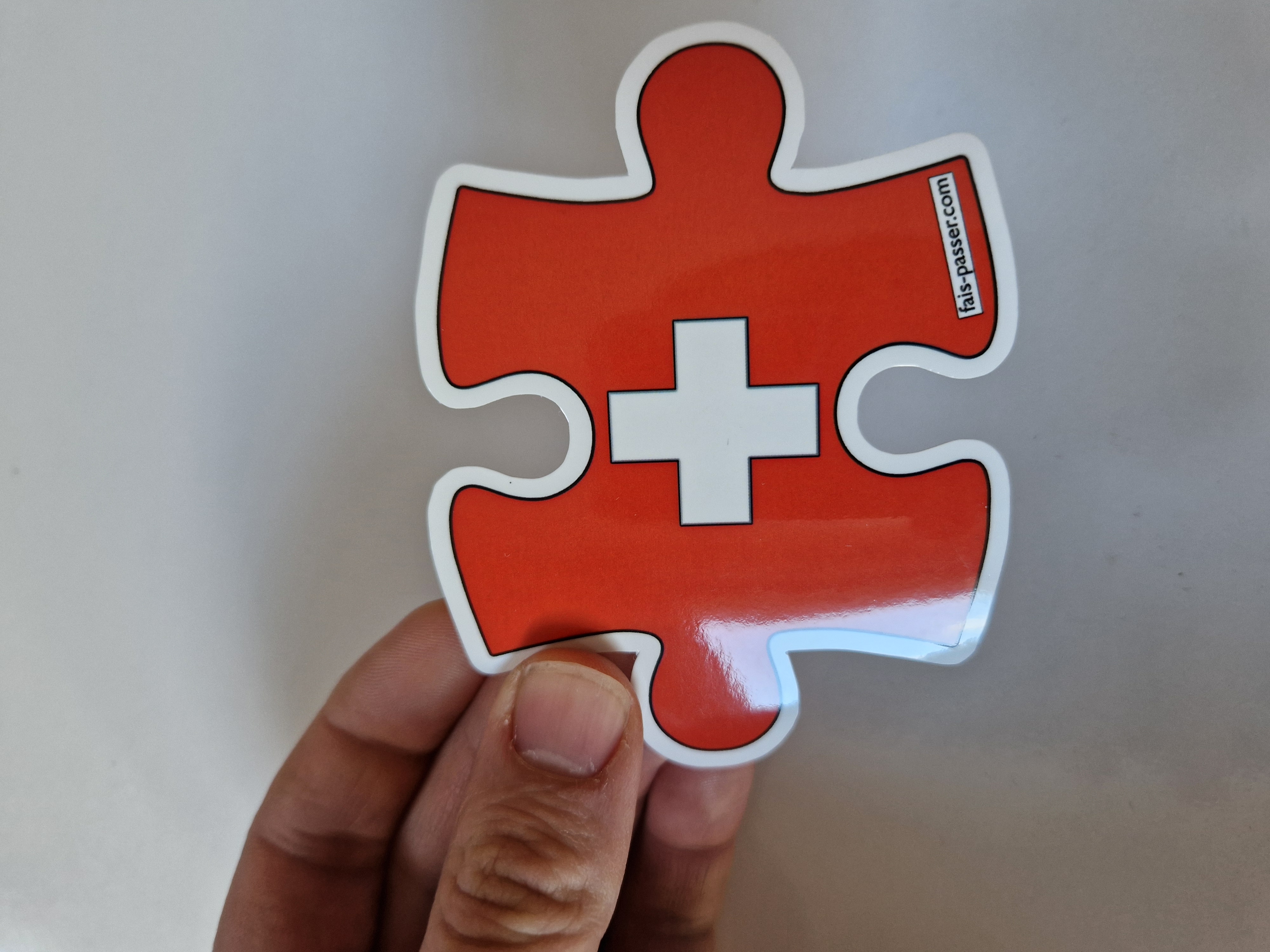 Autocollant Suisse pièce de puzzle