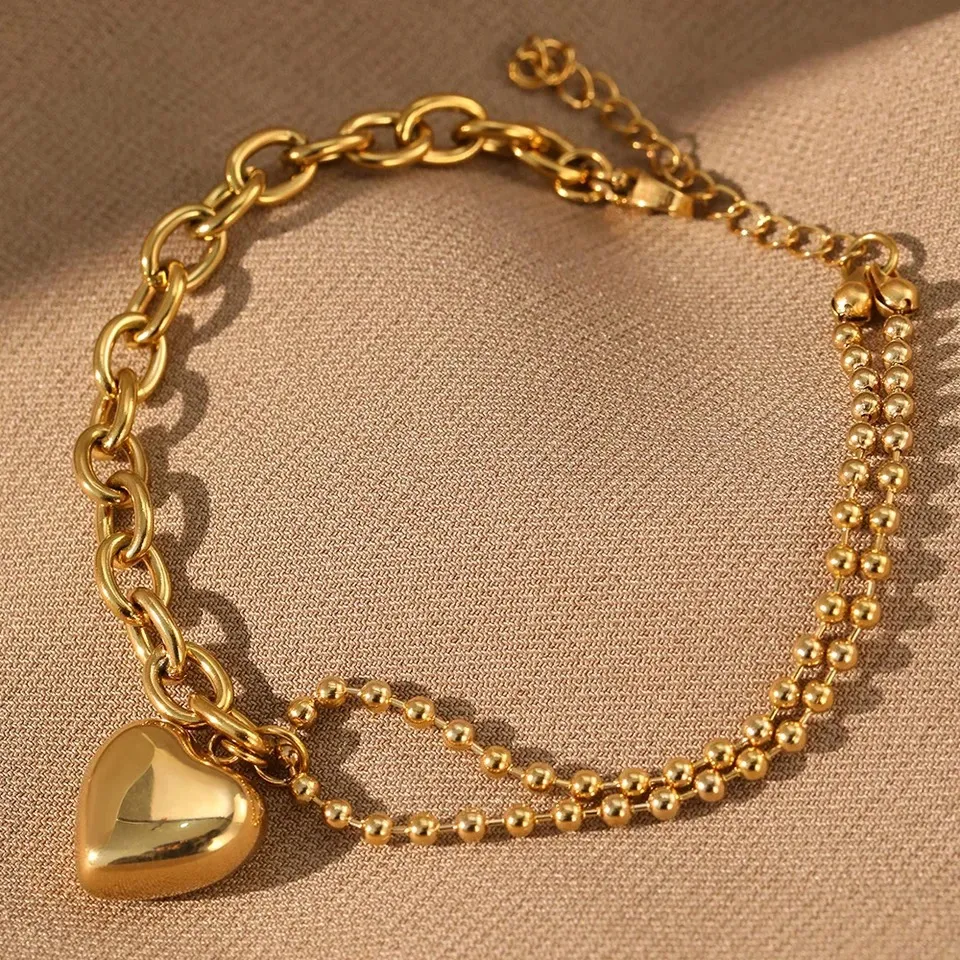 Bracelet doré avec pendentif cœur
