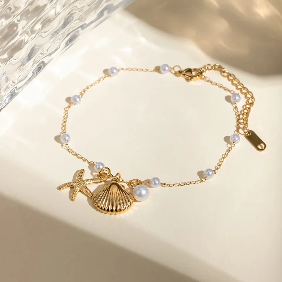 Bracelet en or avec pendentifs