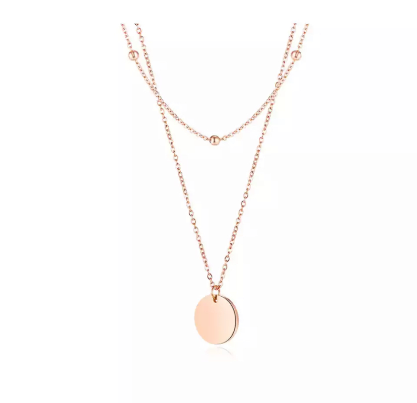 Collier double rang avec pendentif