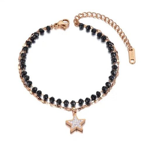 Bracelet étoile en or rose et perles noires