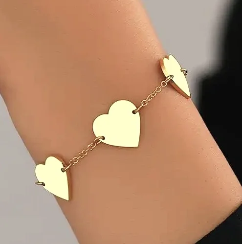 Bracelet à cœurs dorés
