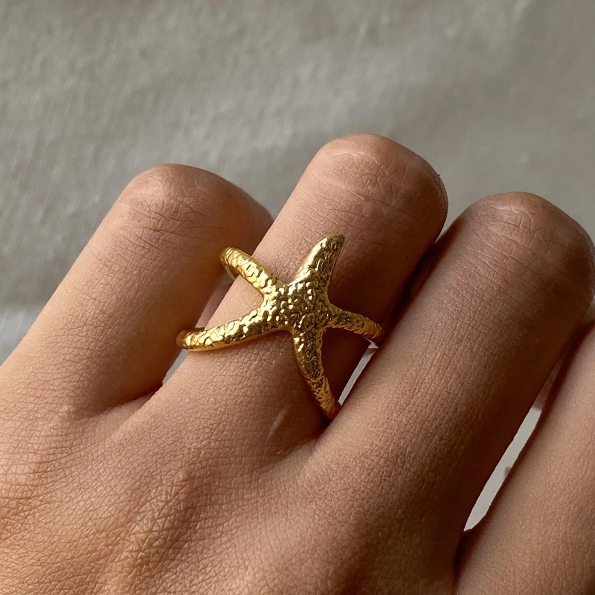 Bague étoile de mer dorée