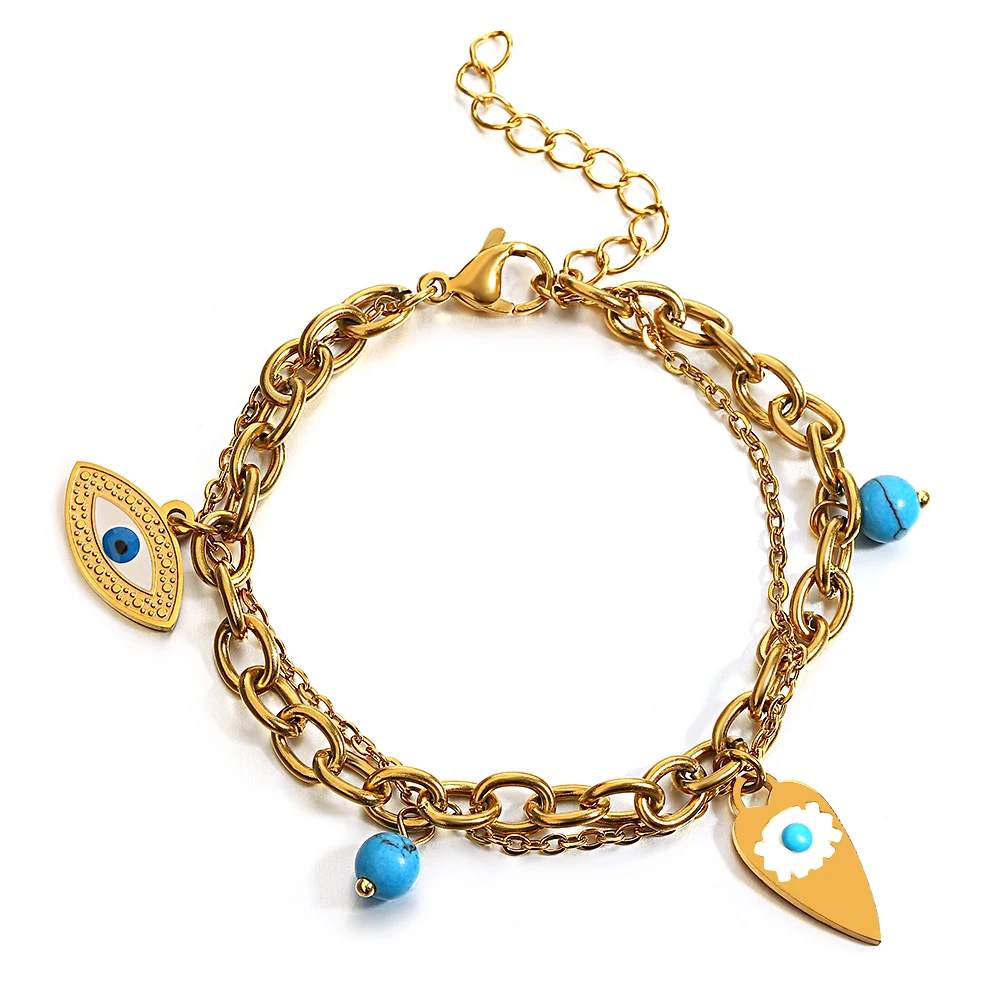 Bracelet doré avec pendentifs œil porte-bonheur