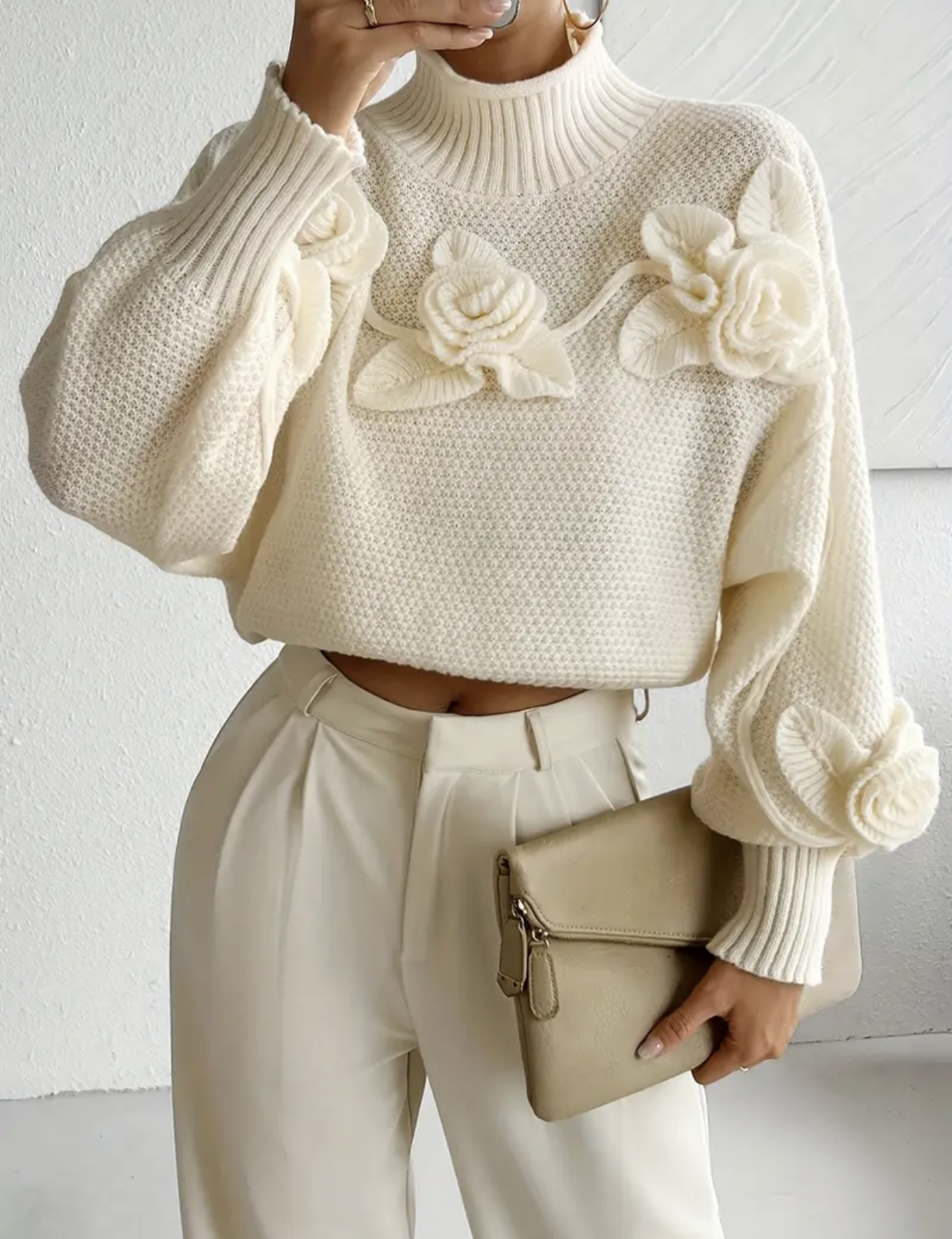 Pull Rosa tricoté avec des fleurs