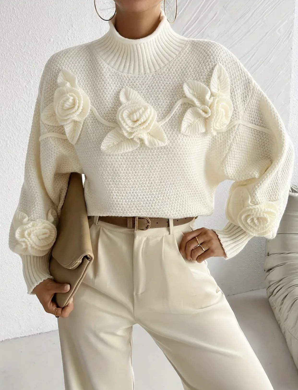 Pull Rosa tricoté avec des fleurs
