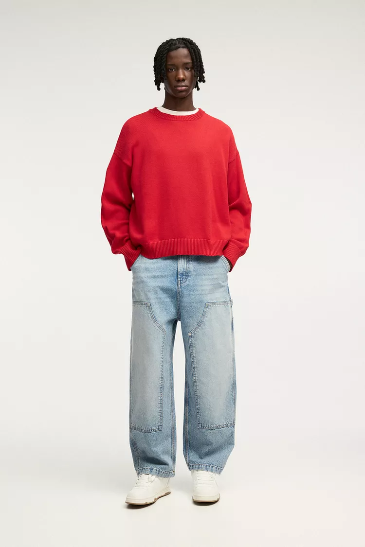  STWD sweater with a graphic on the back 