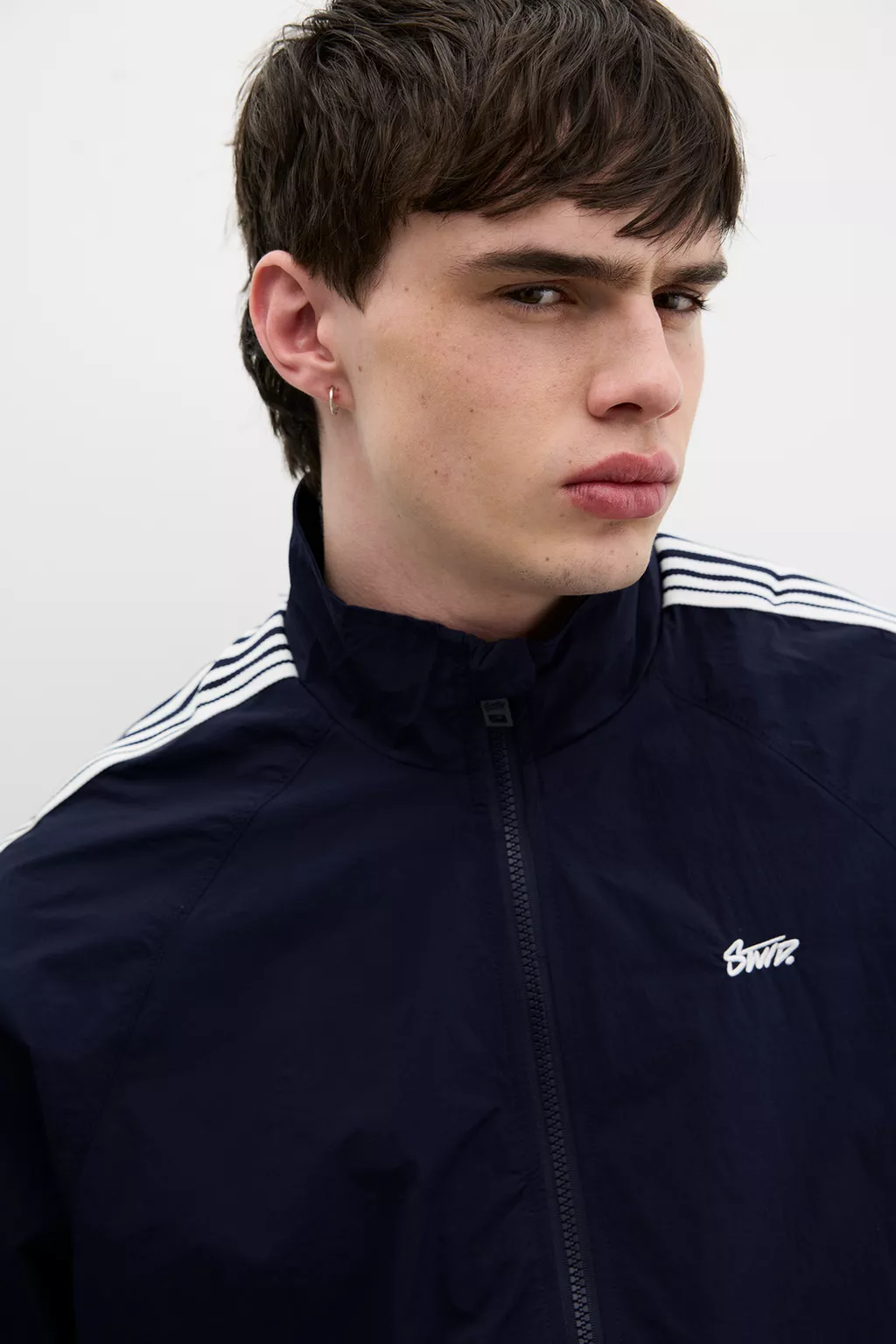 Raincoat with side stripes