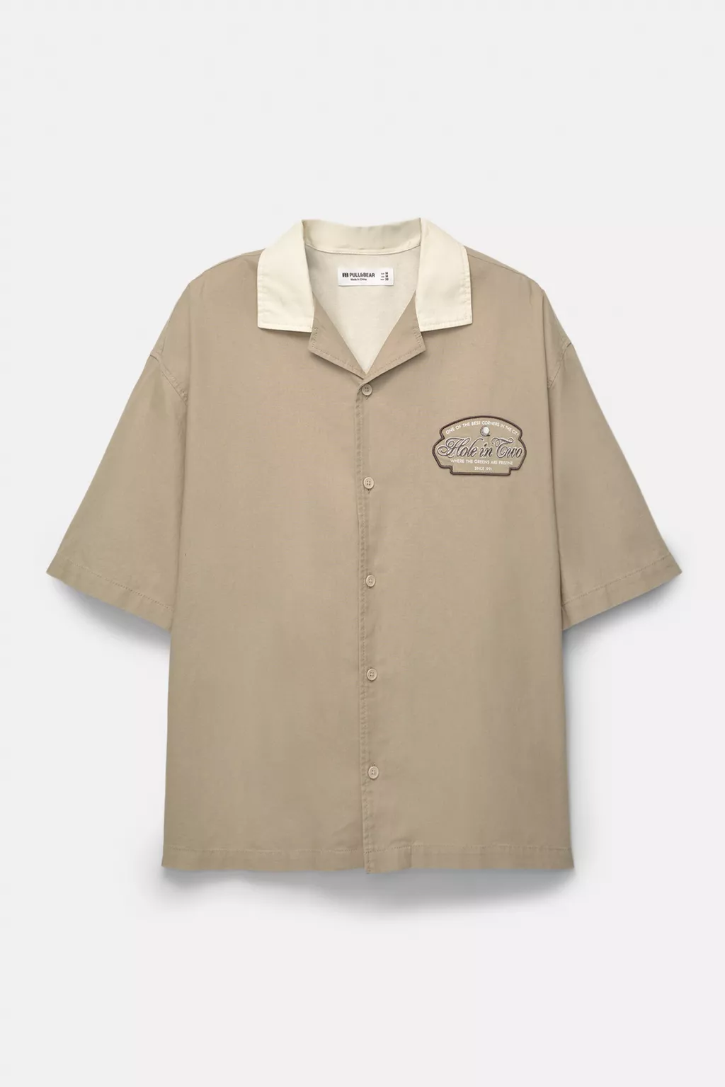 Short sleeve shirt with golf themed print