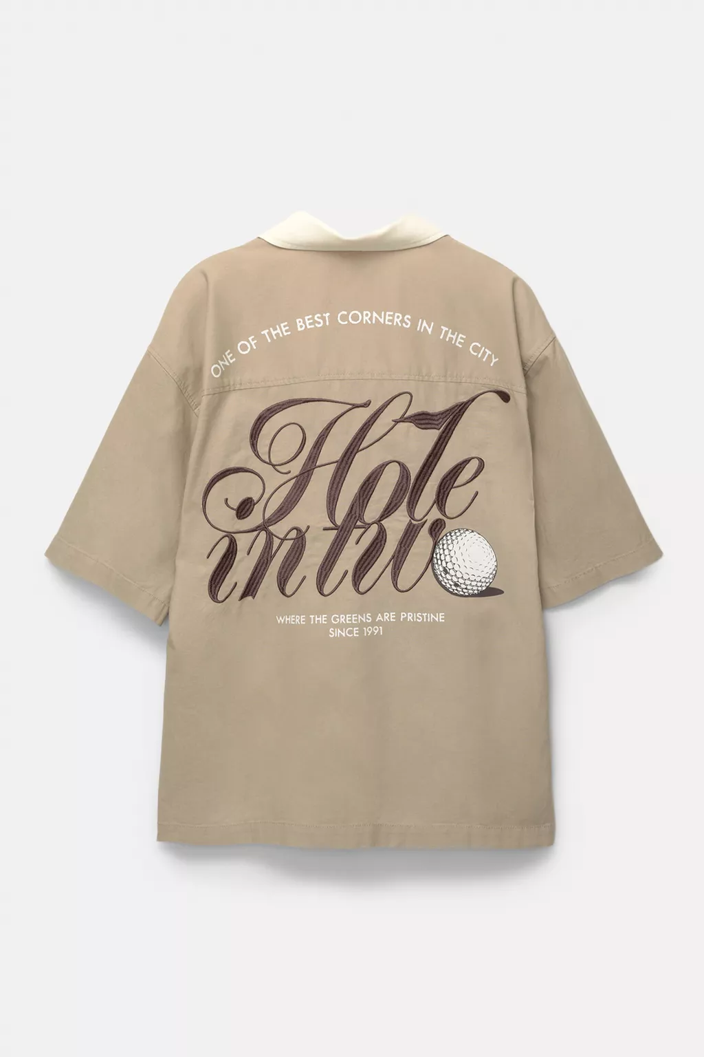 Short sleeve shirt with golf themed print