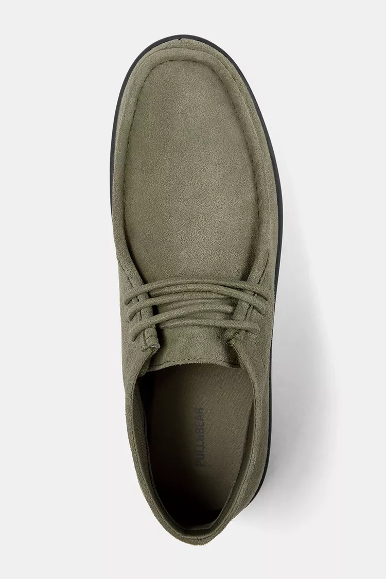 Lace-up leather boots