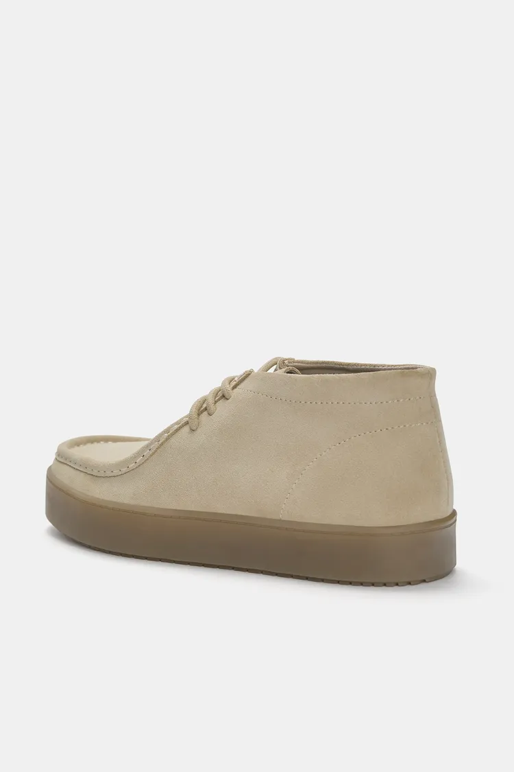 Lace-up leather boots
