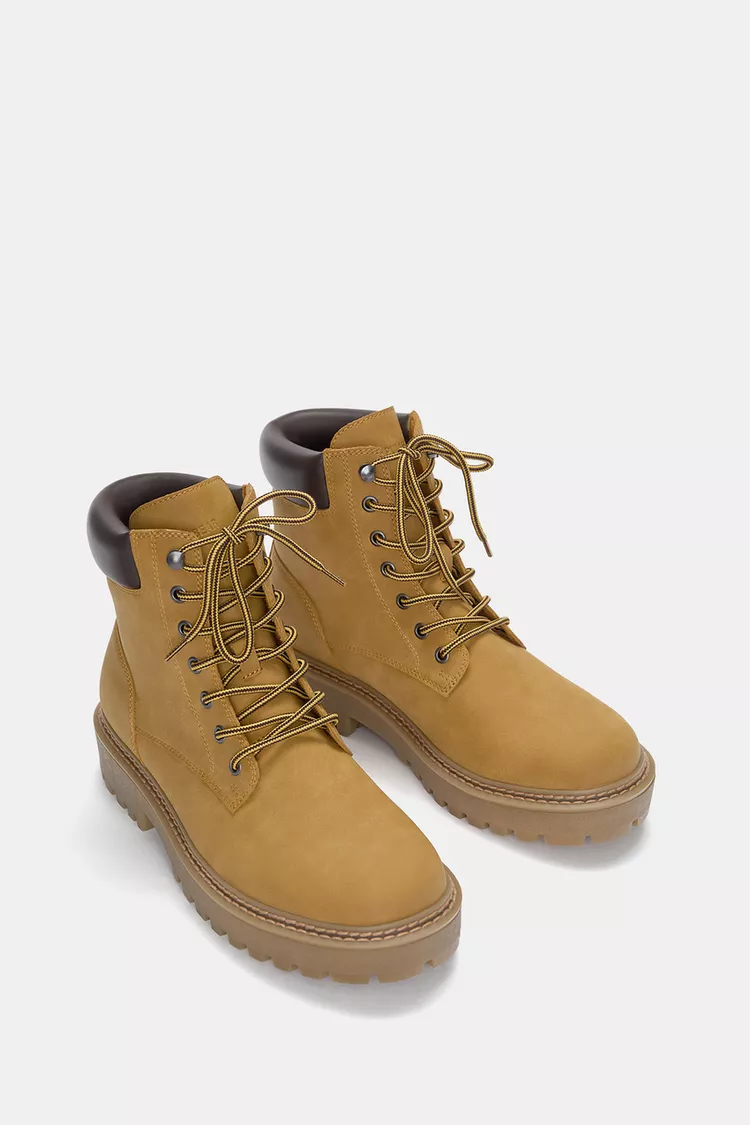 Lace-up flat boots