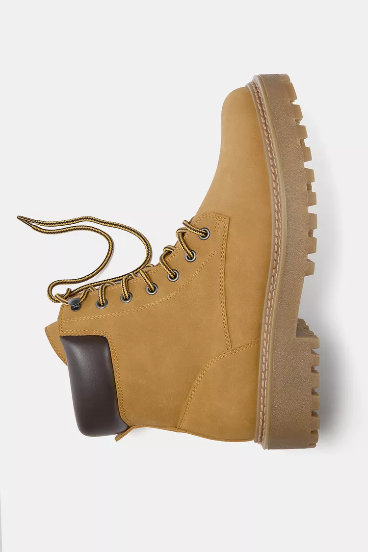 Lace-up flat boots