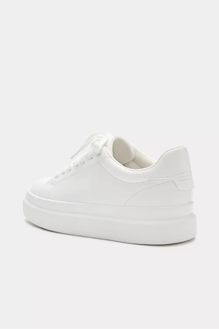 Sneakers with voluminous soles
