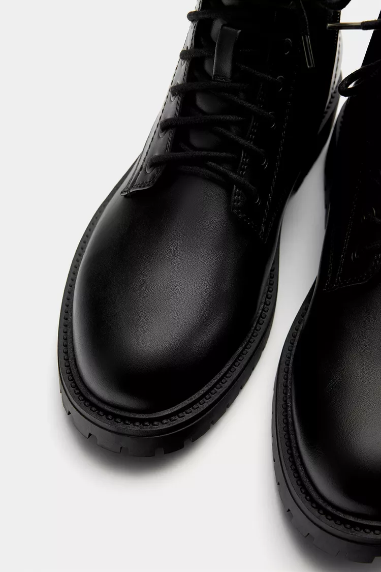 Lace-up flat boots