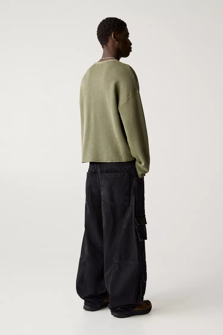 Sweater with faded effect and seamless edges