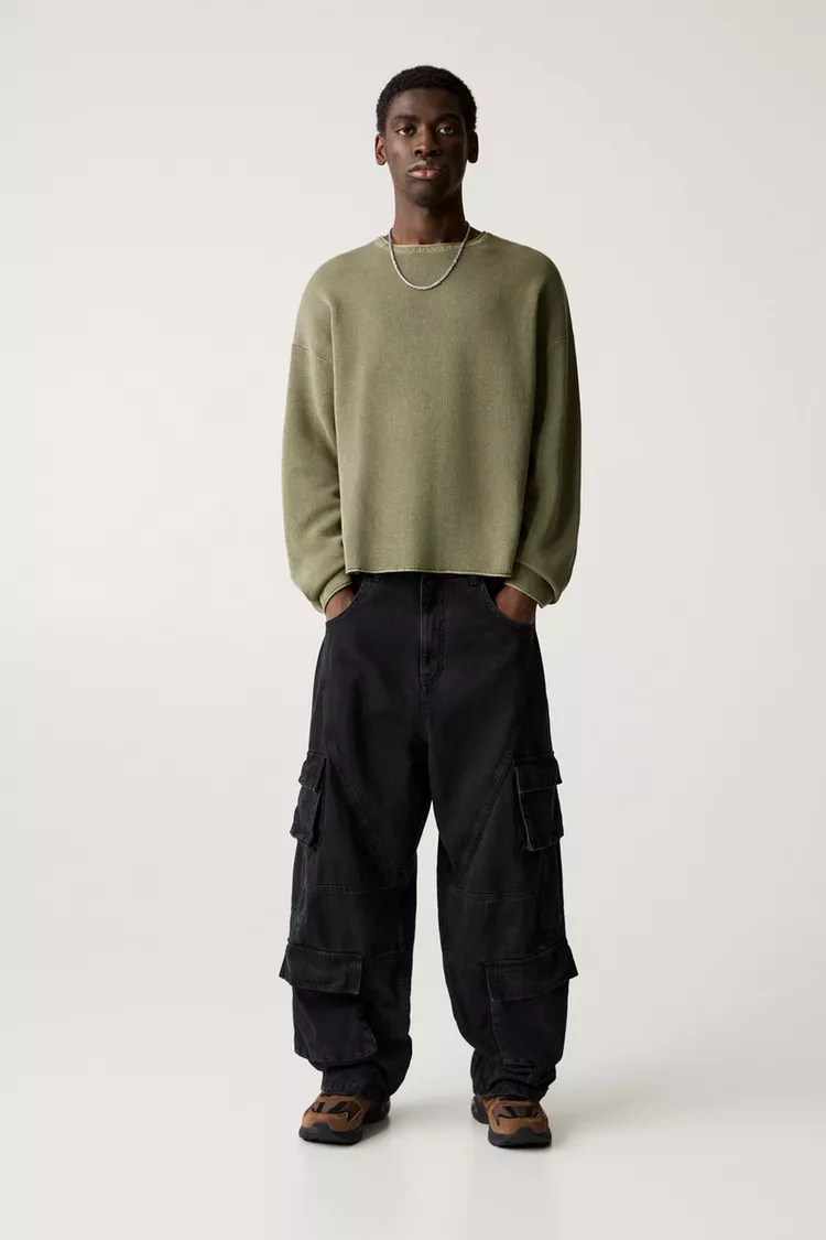 Sweater with faded effect and seamless edges