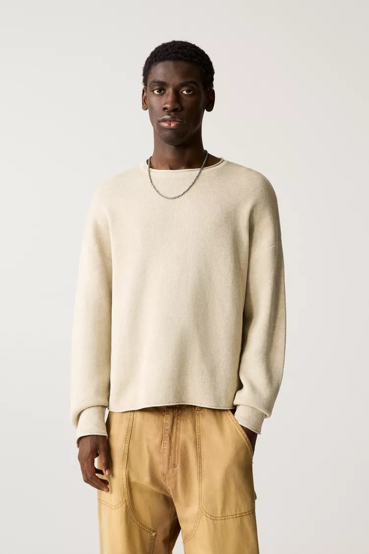Sweater with faded effect and seamless edges