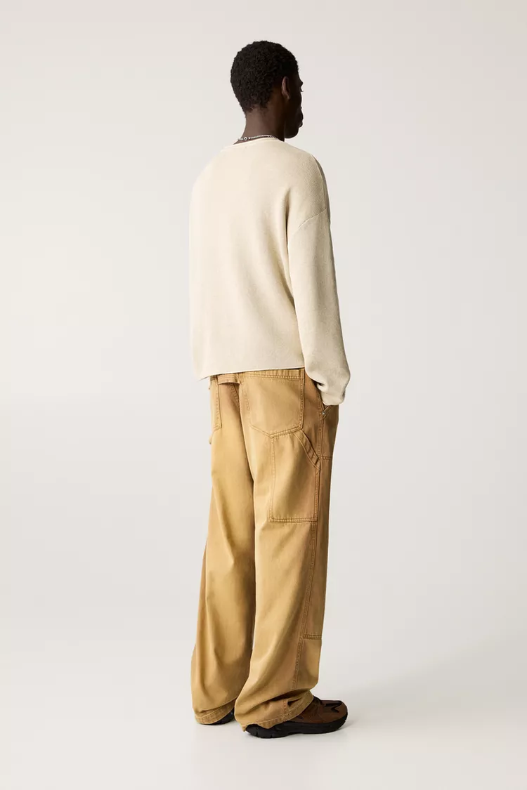 Sweater with faded effect and seamless edges
